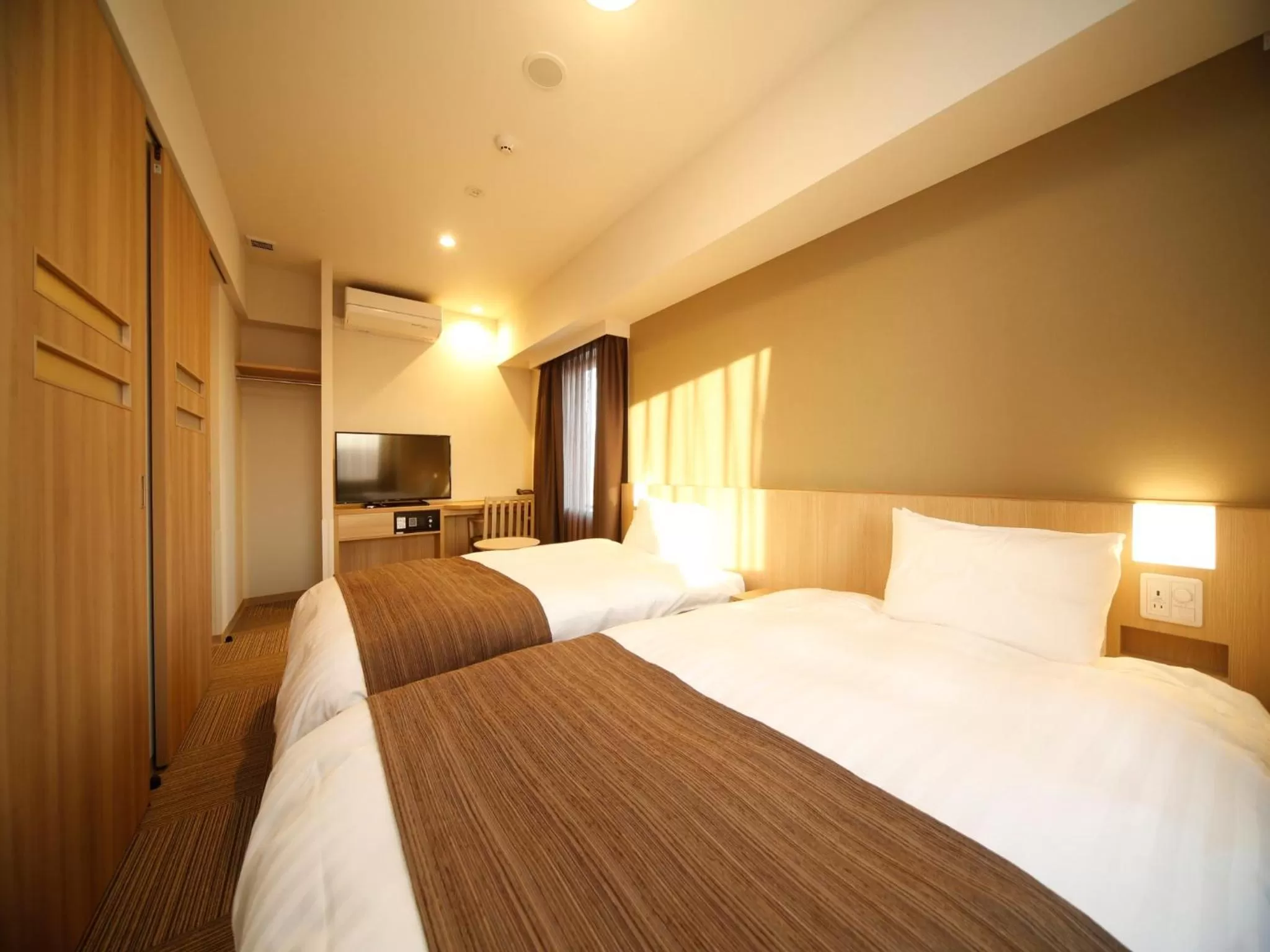 Bed in Dormy Inn Hon-Hachinohe