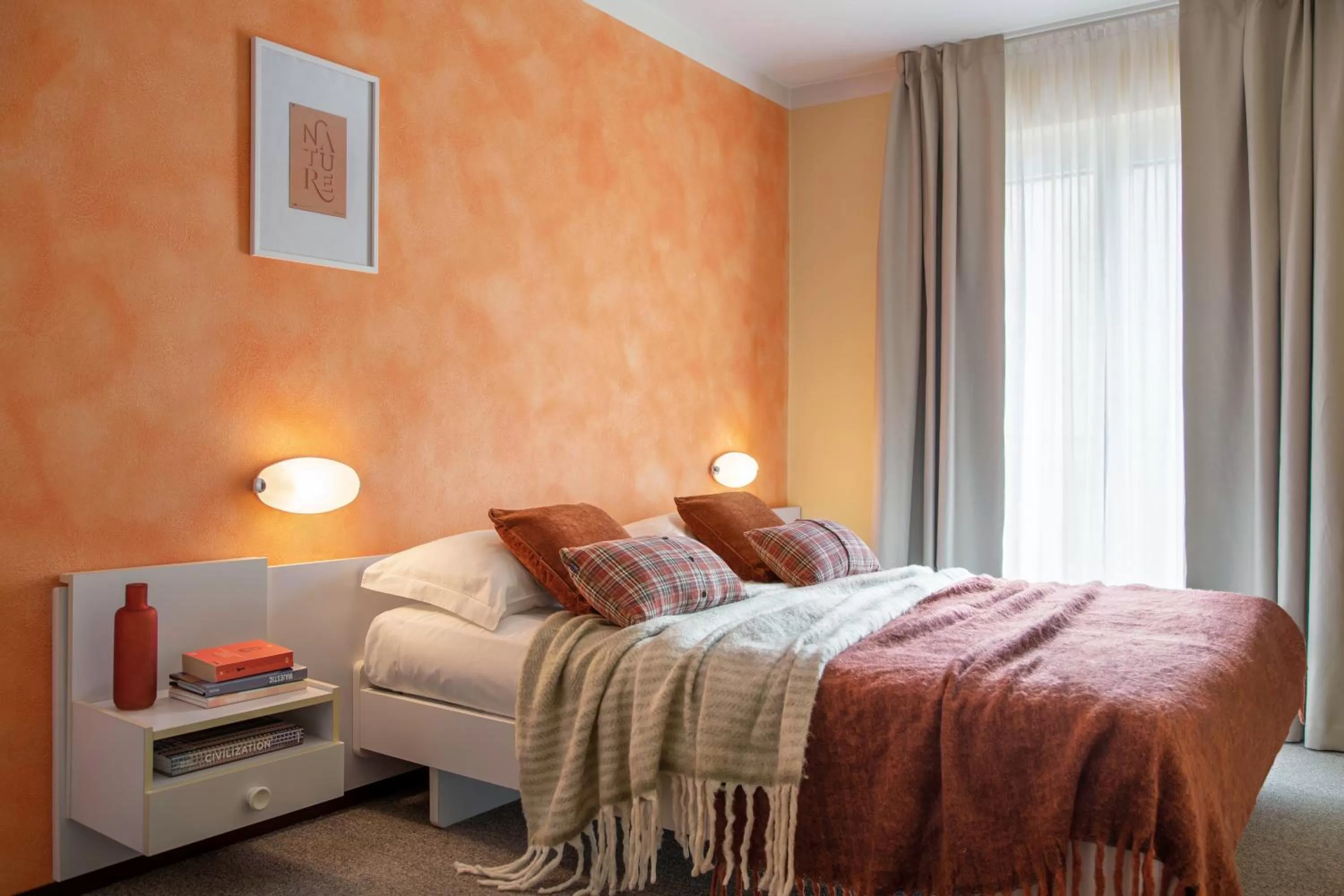 Bed in Meublè La Betulla