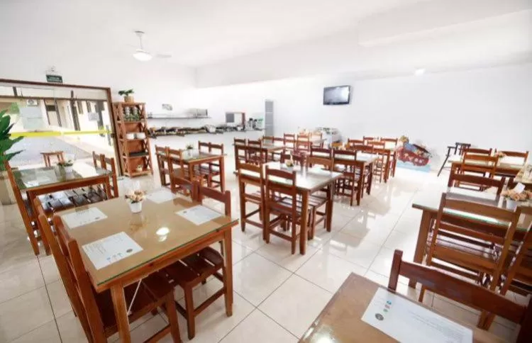 Dining area in Hotel Portela III - Aprox 600m do Thermas dos Laranjais e Hot Beach