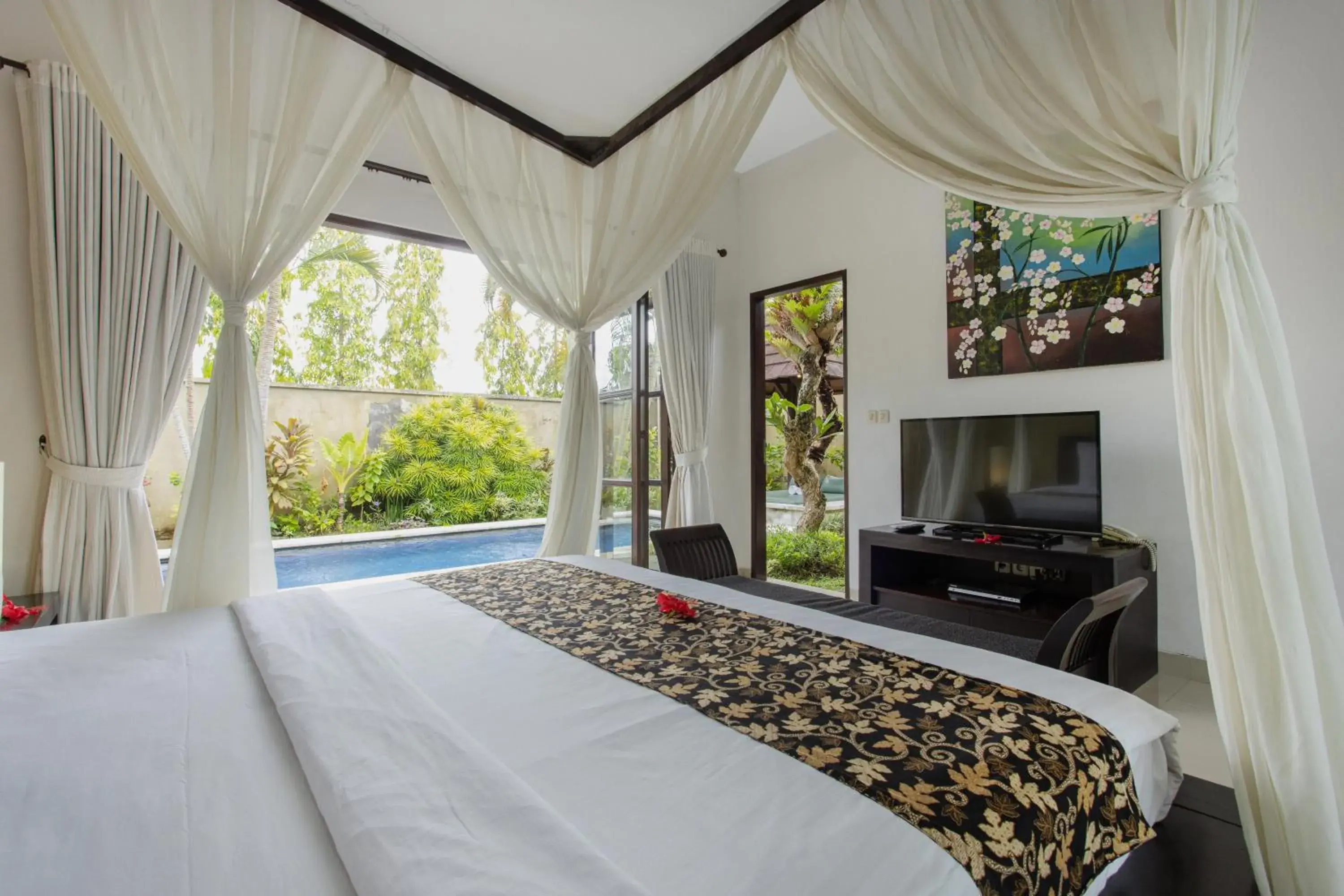 Bed in The Bidadari Villas and Spa