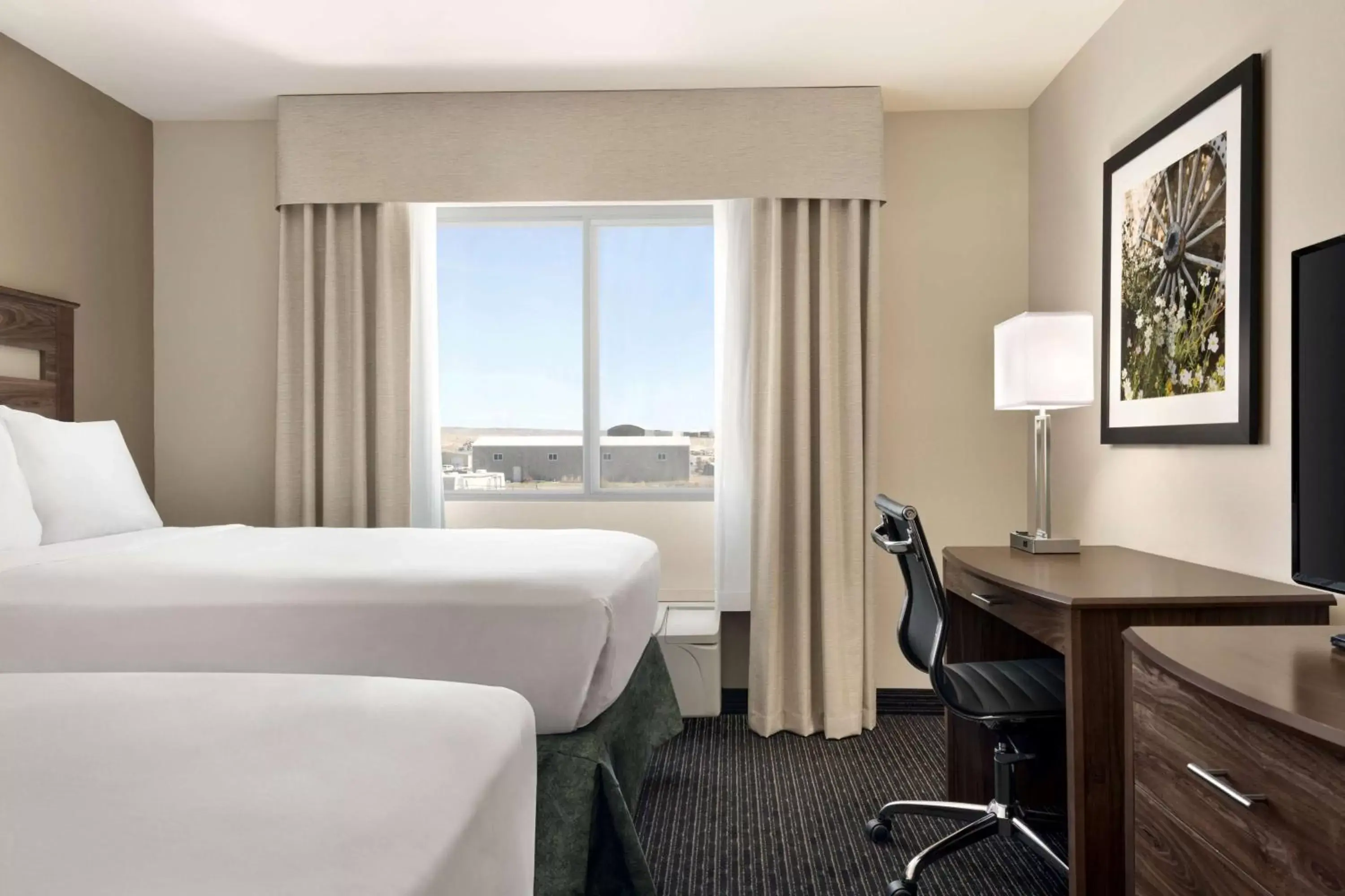 Photo of the whole room, Bed in Baymont by Wyndham Rawlins Photo of the whole room, Bed in Baymont by Wyndham Rawlins