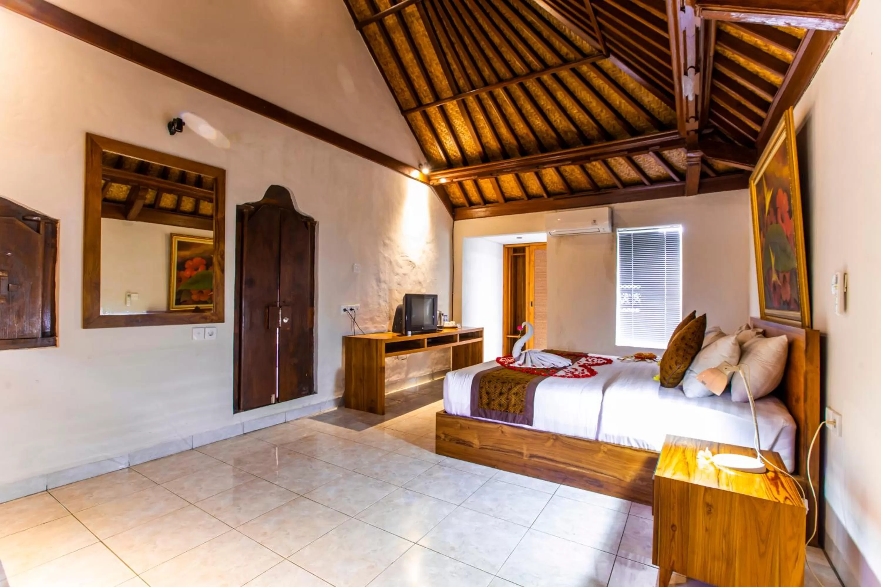 Bed in Seken Cottages Ubud