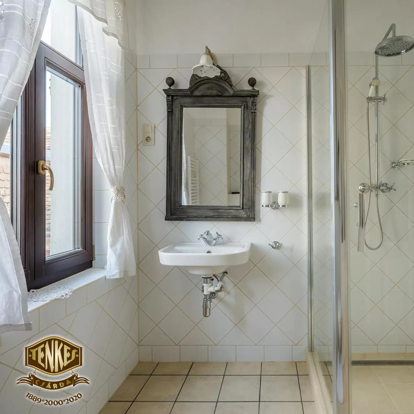 Bathroom in Tenkes Fogadó és Vendégház Harkány