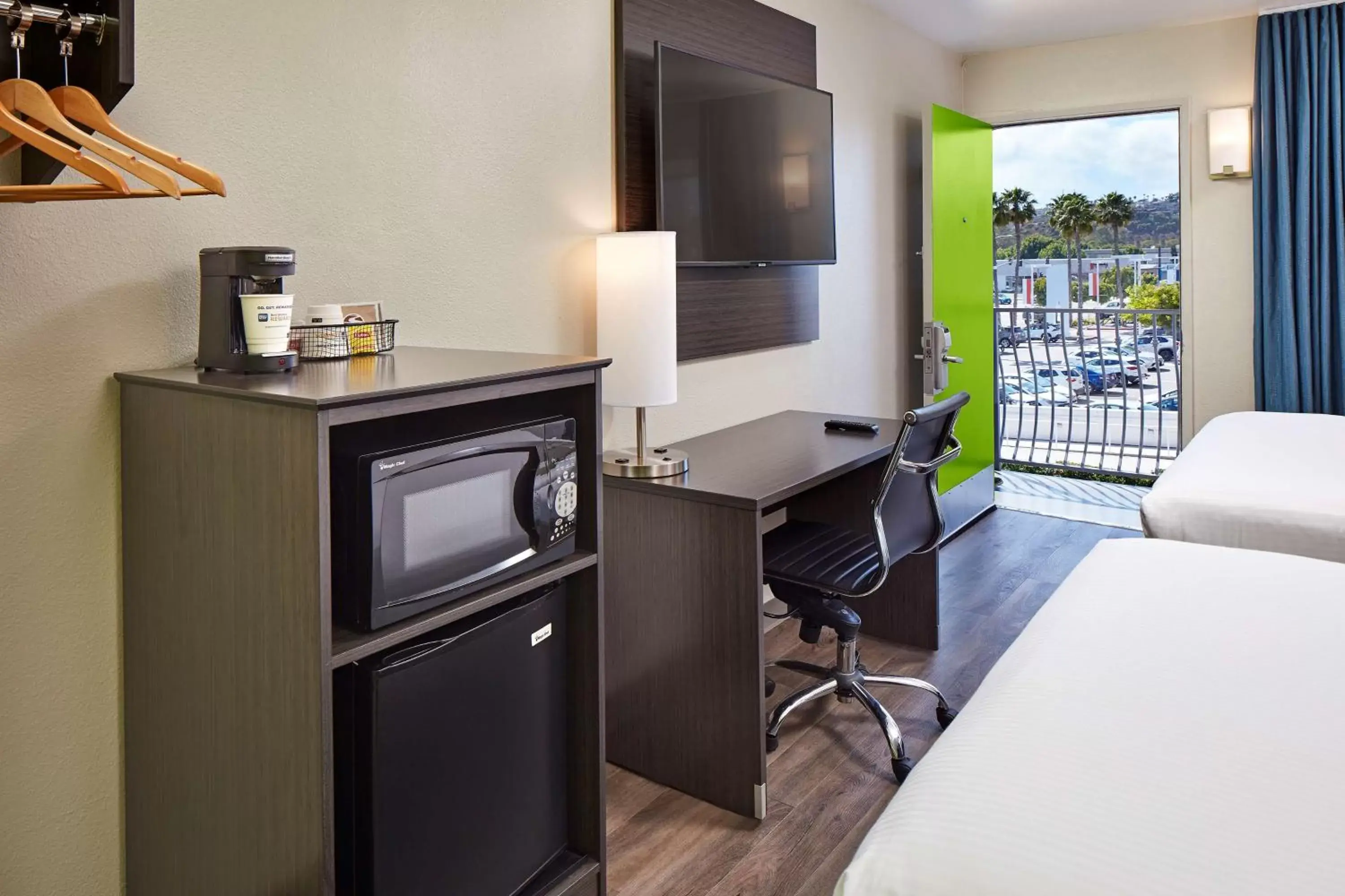 Photo of the whole room, TV/Entertainment Center in SureStay Hotel by Best Western San Diego Pacific Beach