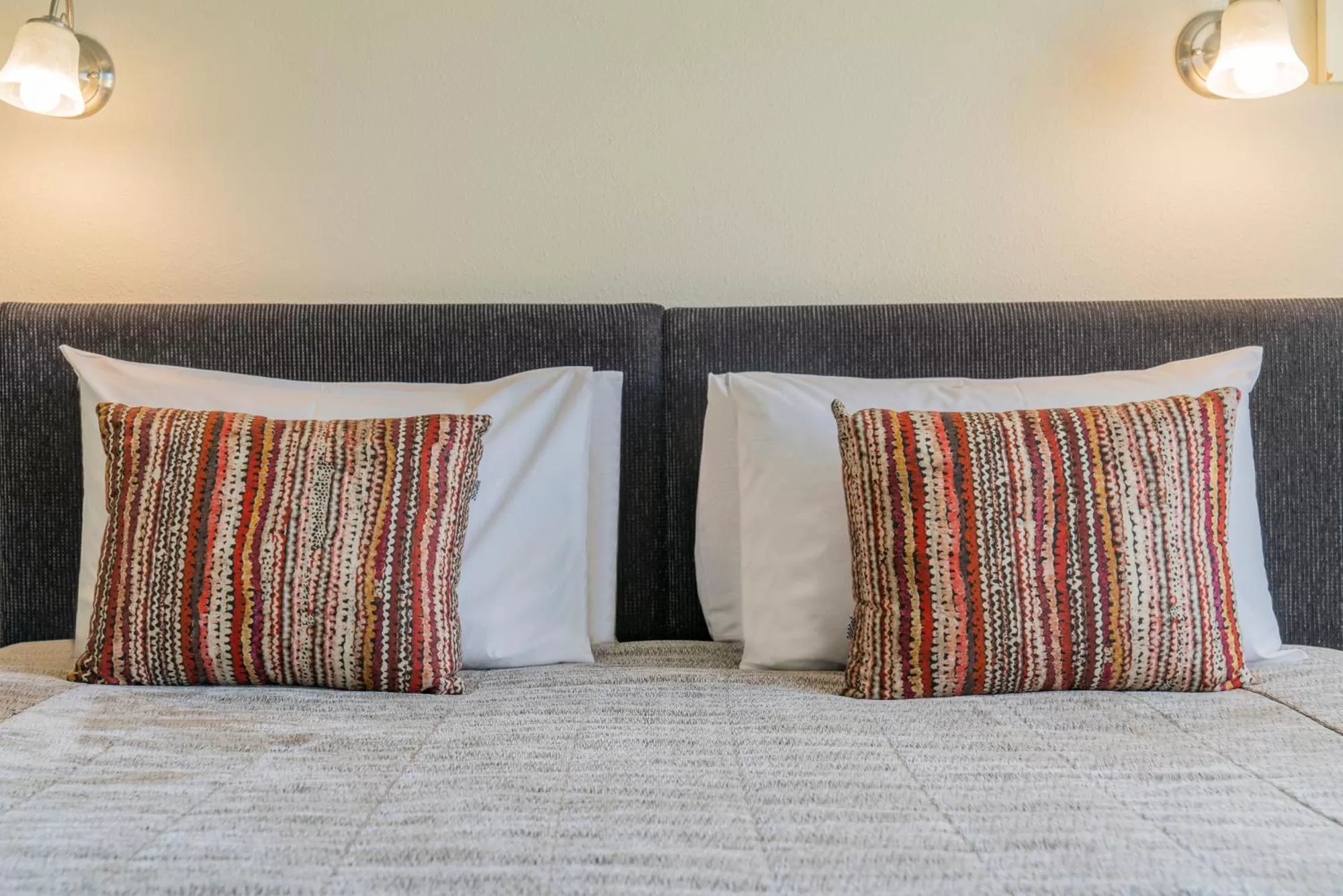 Bed in Silver Fern Rotorua Suites & Spa