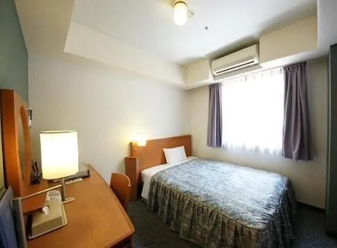 Bed in Hotel Landmark Nagoya