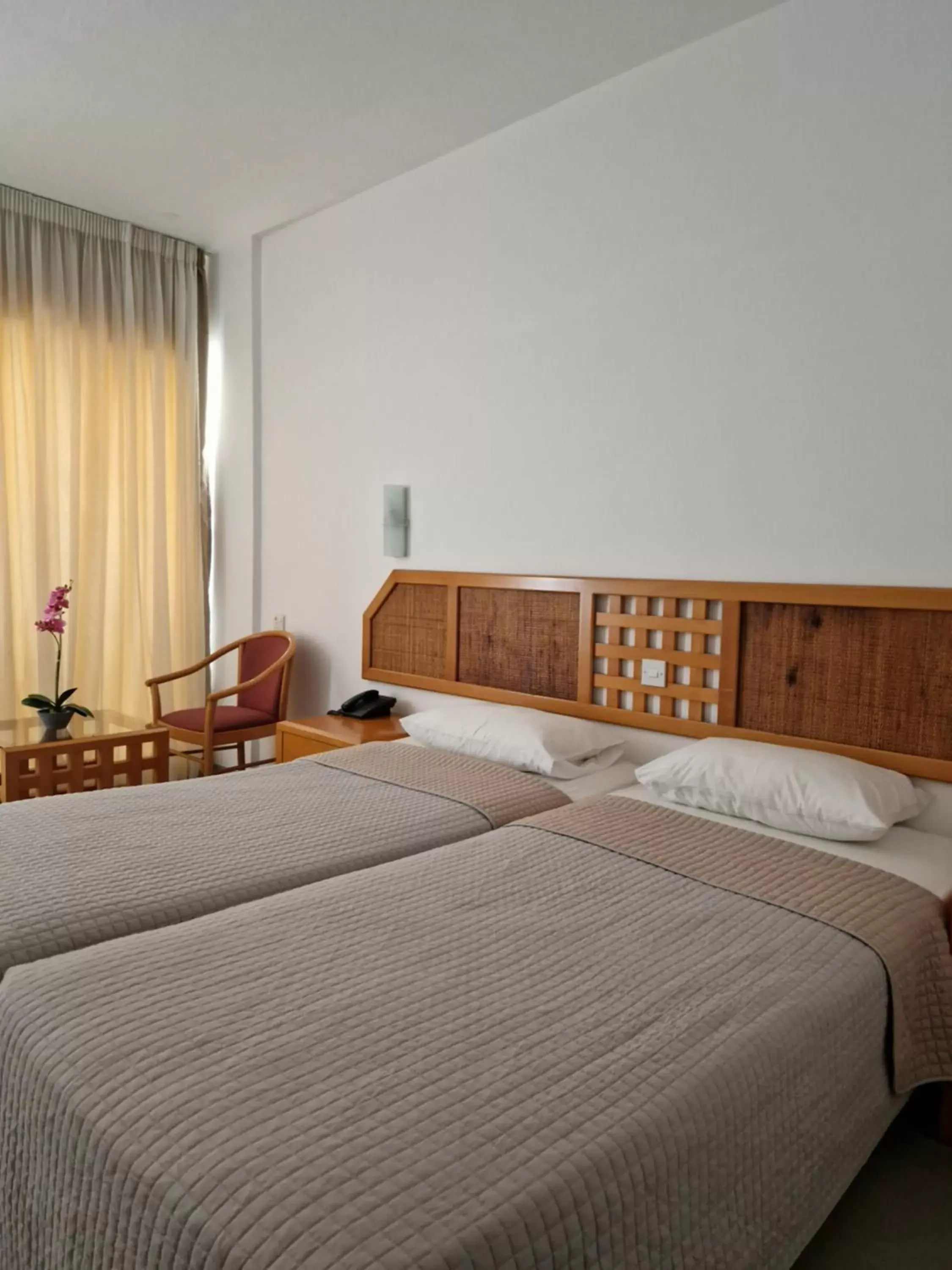 Bed in Navarria Blue Hotel