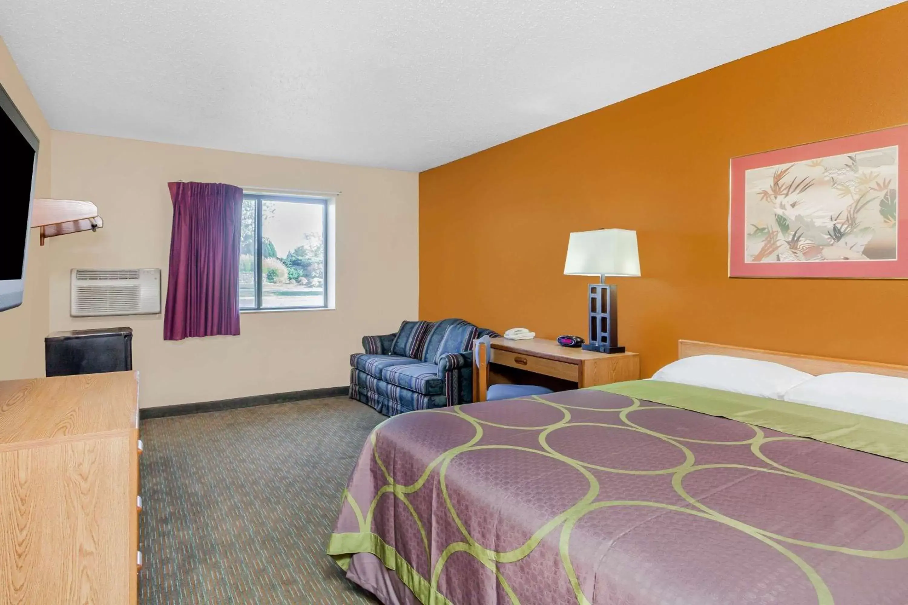 Photo of the whole room in Super 8 by Wyndham Charlotte/Amusement Park Area