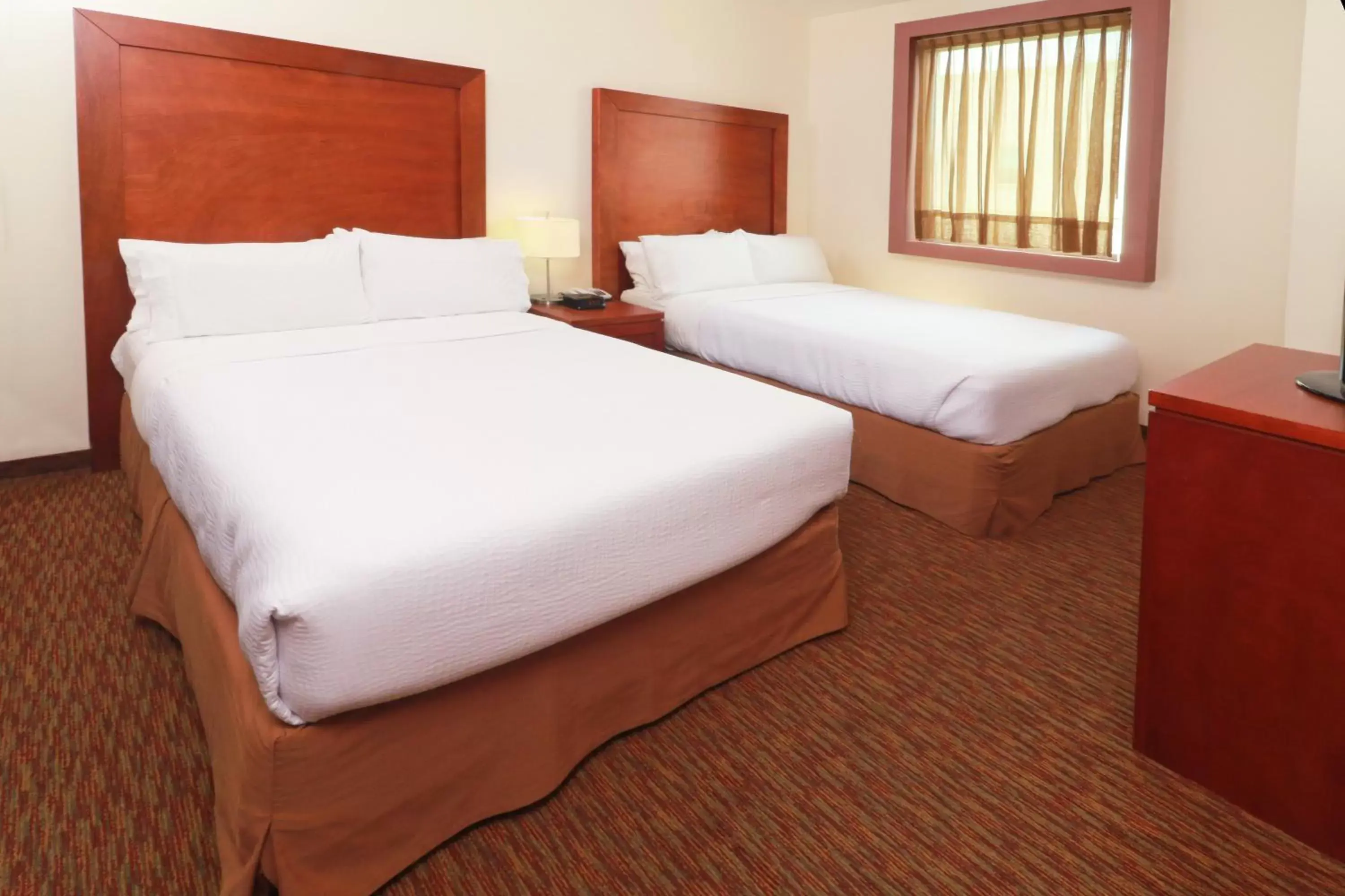 Photo of the whole room, Bed in Staybridge Suites Queretaro, an IHG Hotel