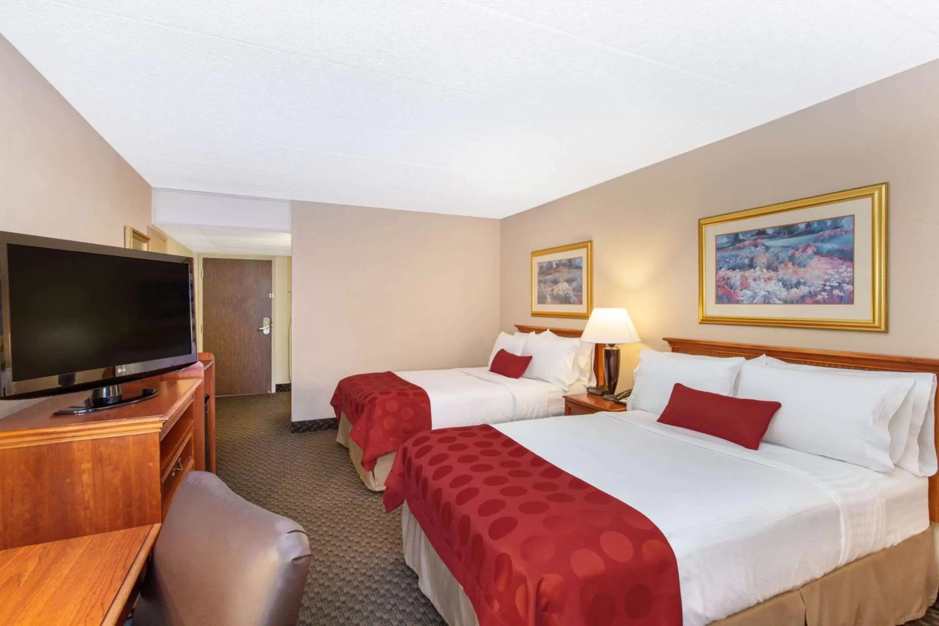 Photo of the whole room, Bed in Ramada by Wyndham Midtown Grand Island