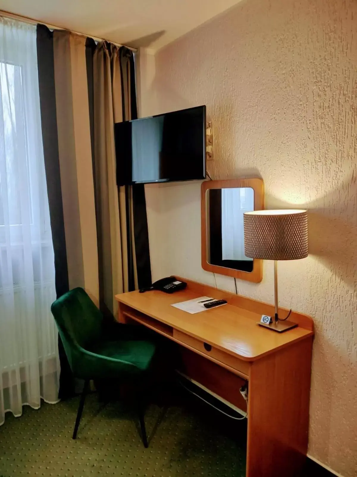 TV/Entertainment Center in Hotel Gromada Poznań