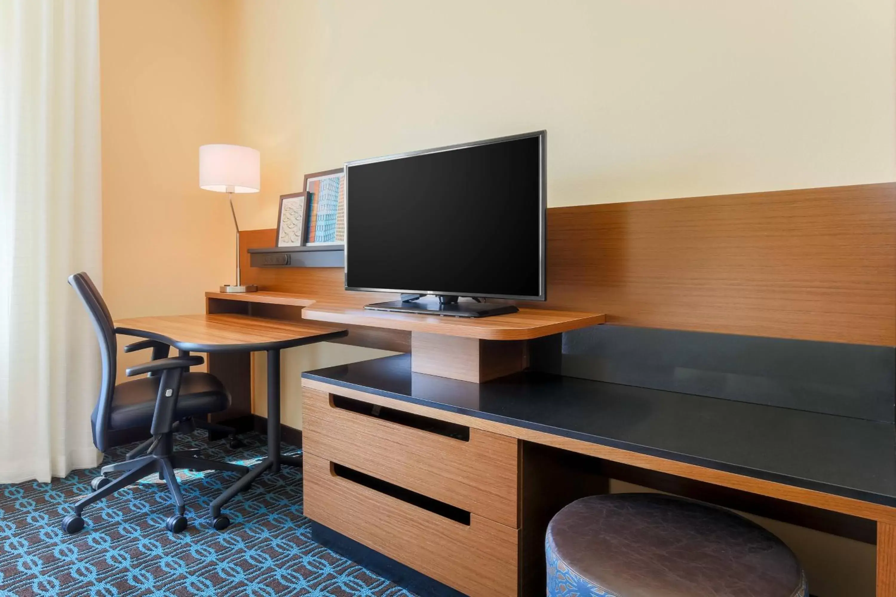 Photo of the whole room, TV/Entertainment Center in Fairfield Inn & Suites by Marriott Cotulla