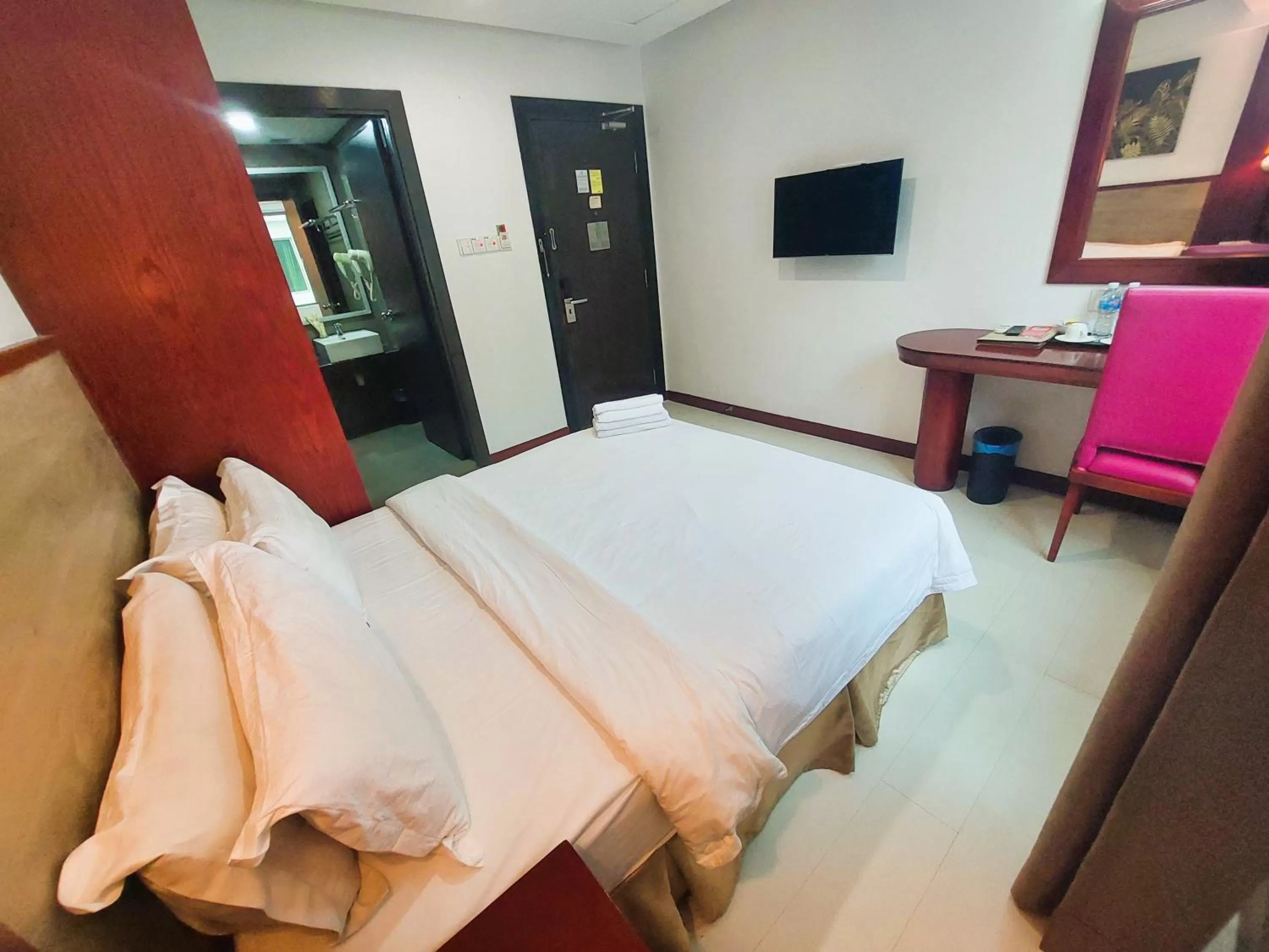 Bed in Celyn City Hotel