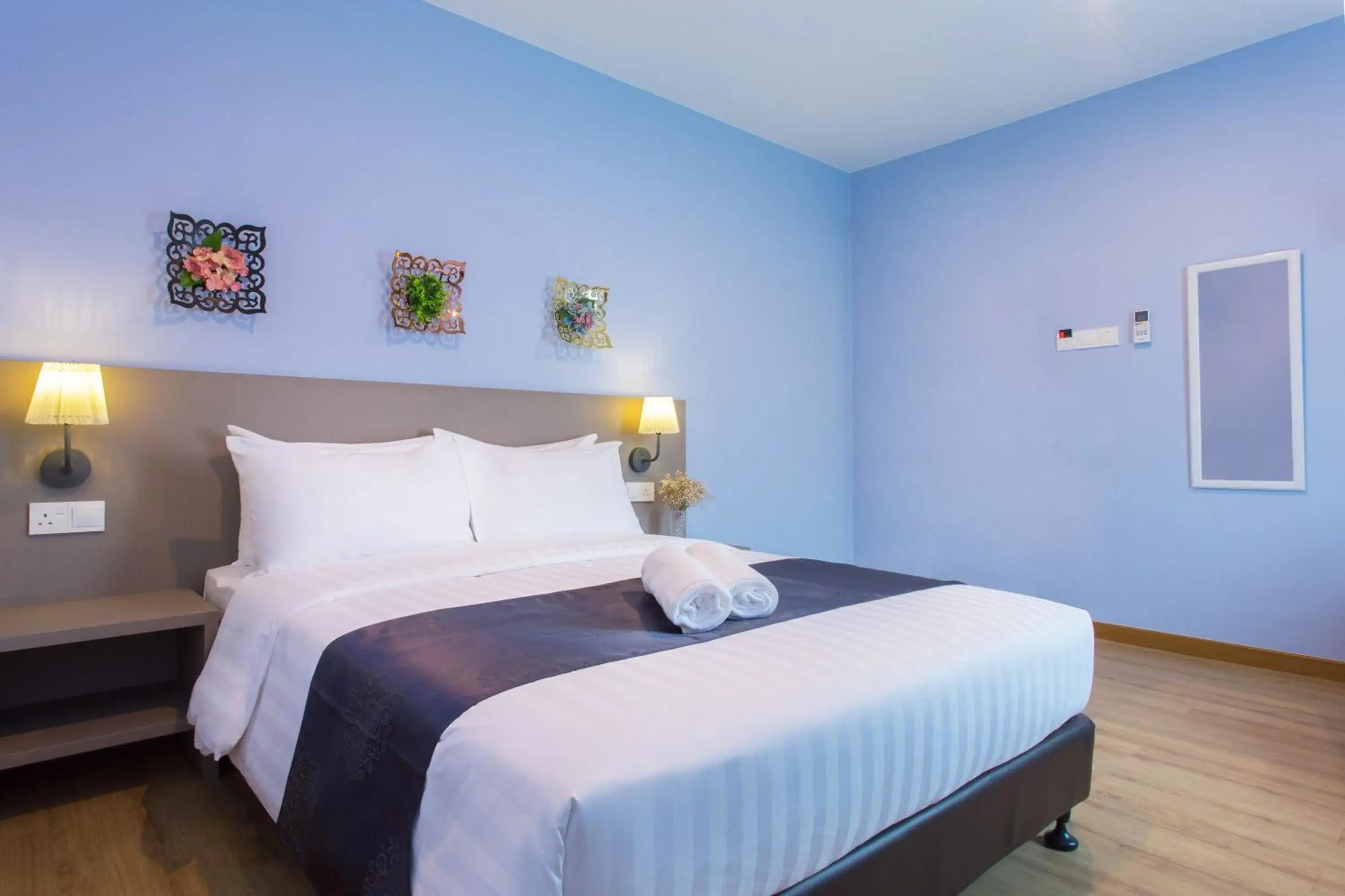 Bed in DK Hotel Bed in DK Hotel