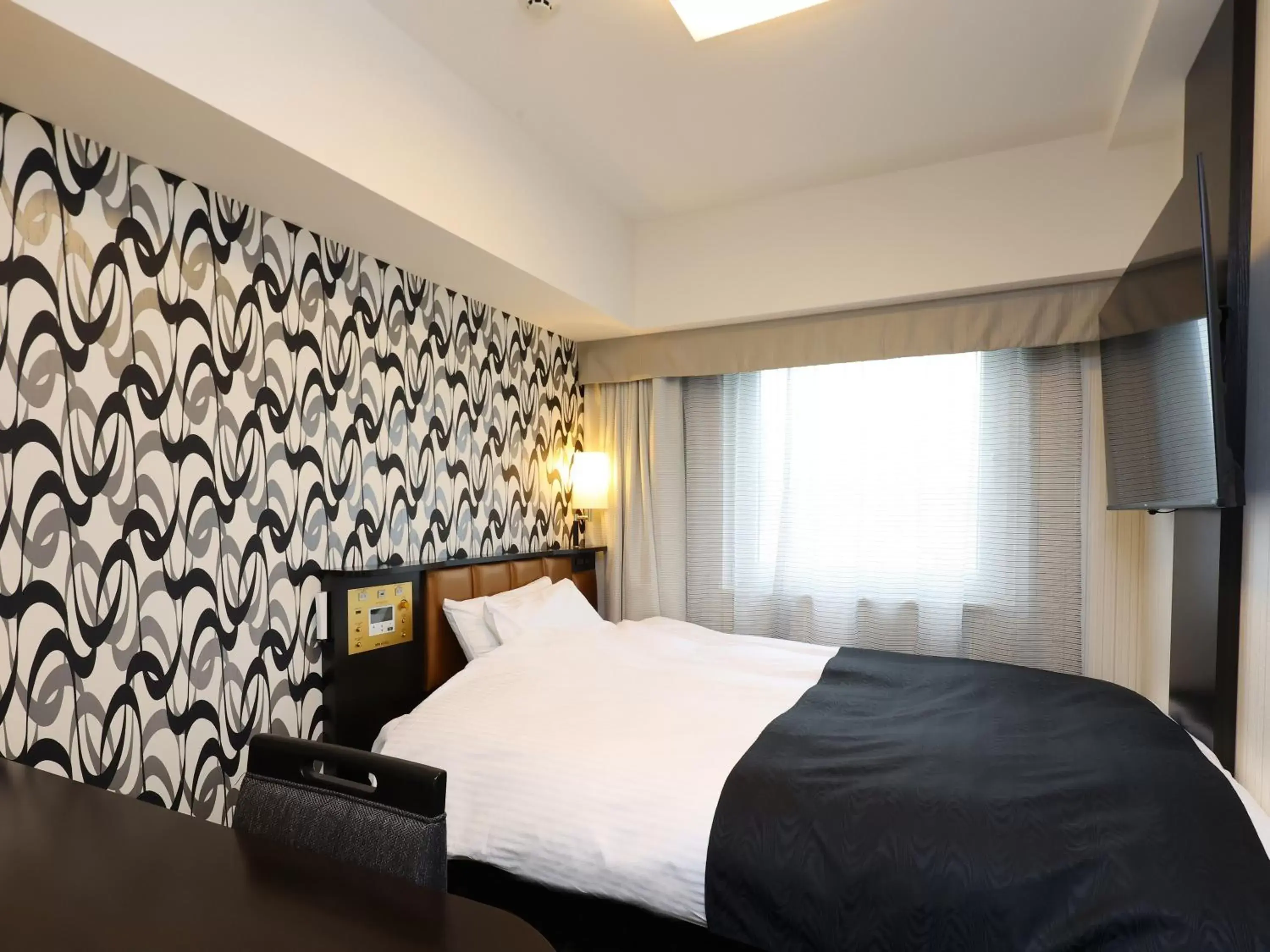 Photo of the whole room, Bed in APA Hotel Shizuoka-eki Kita