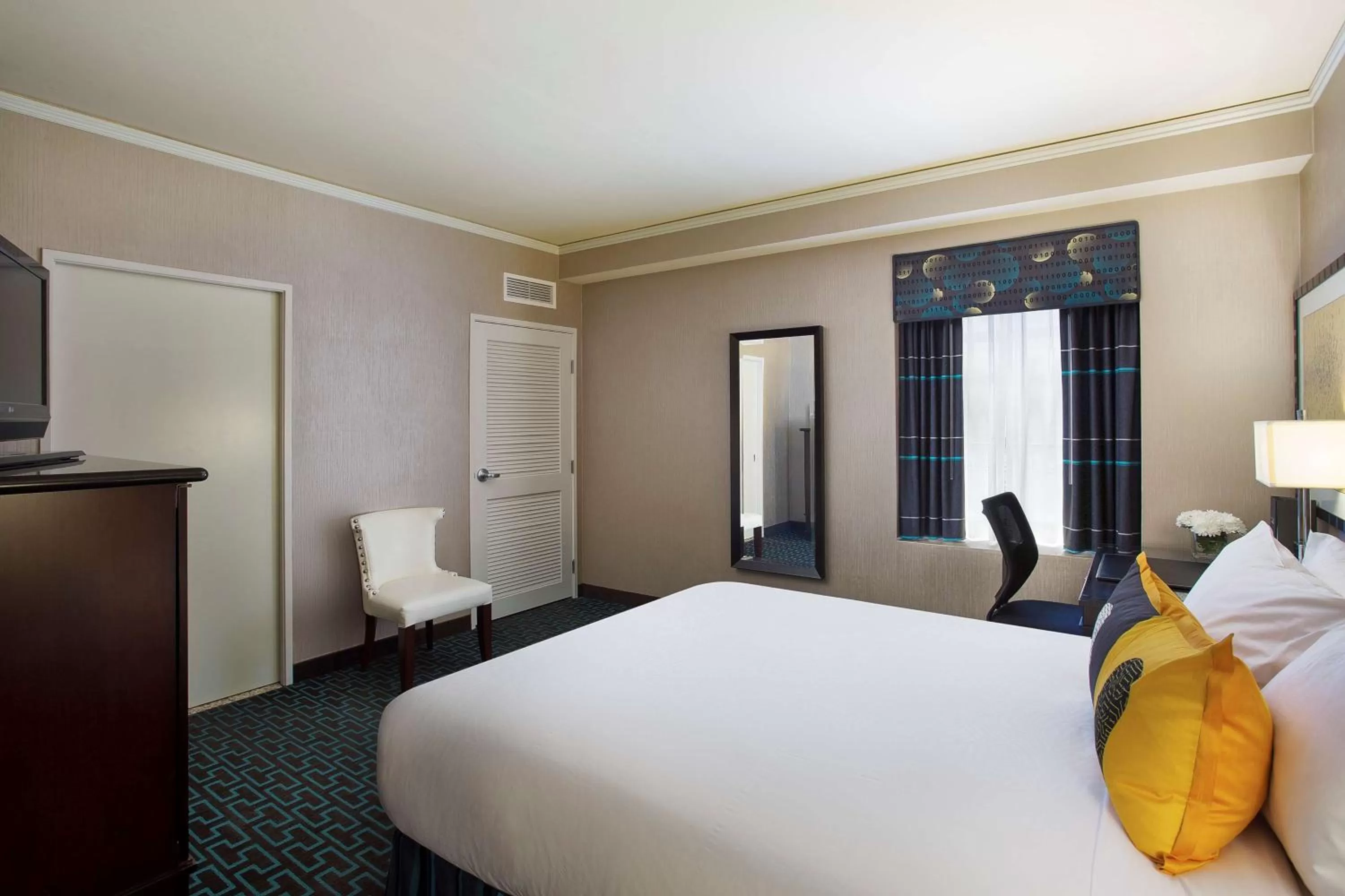 Bed in Juniper Hotel Cupertino, Curio Collection by Hilton