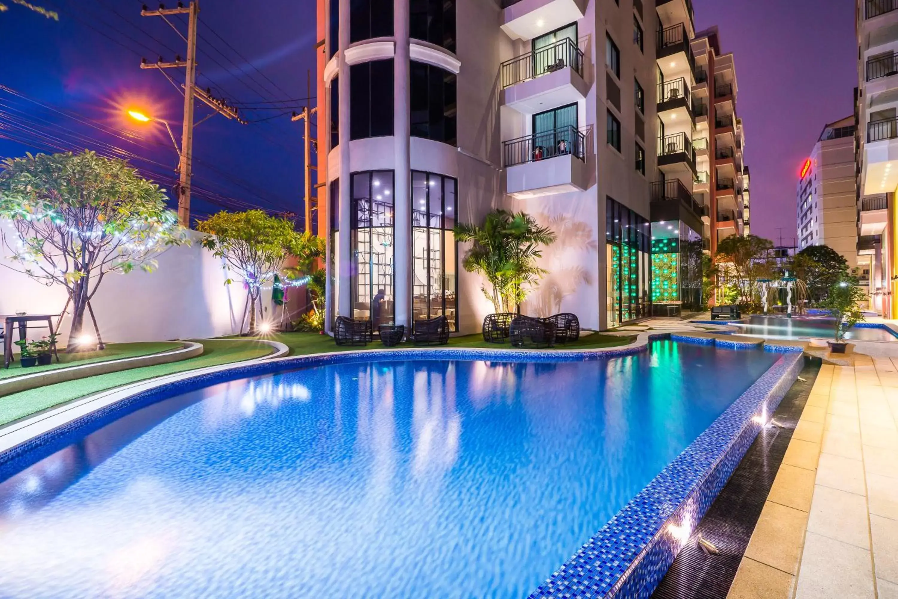 Swimming pool, Property Building in Citrus Grande Hotel Pattaya by Compass Hospitality