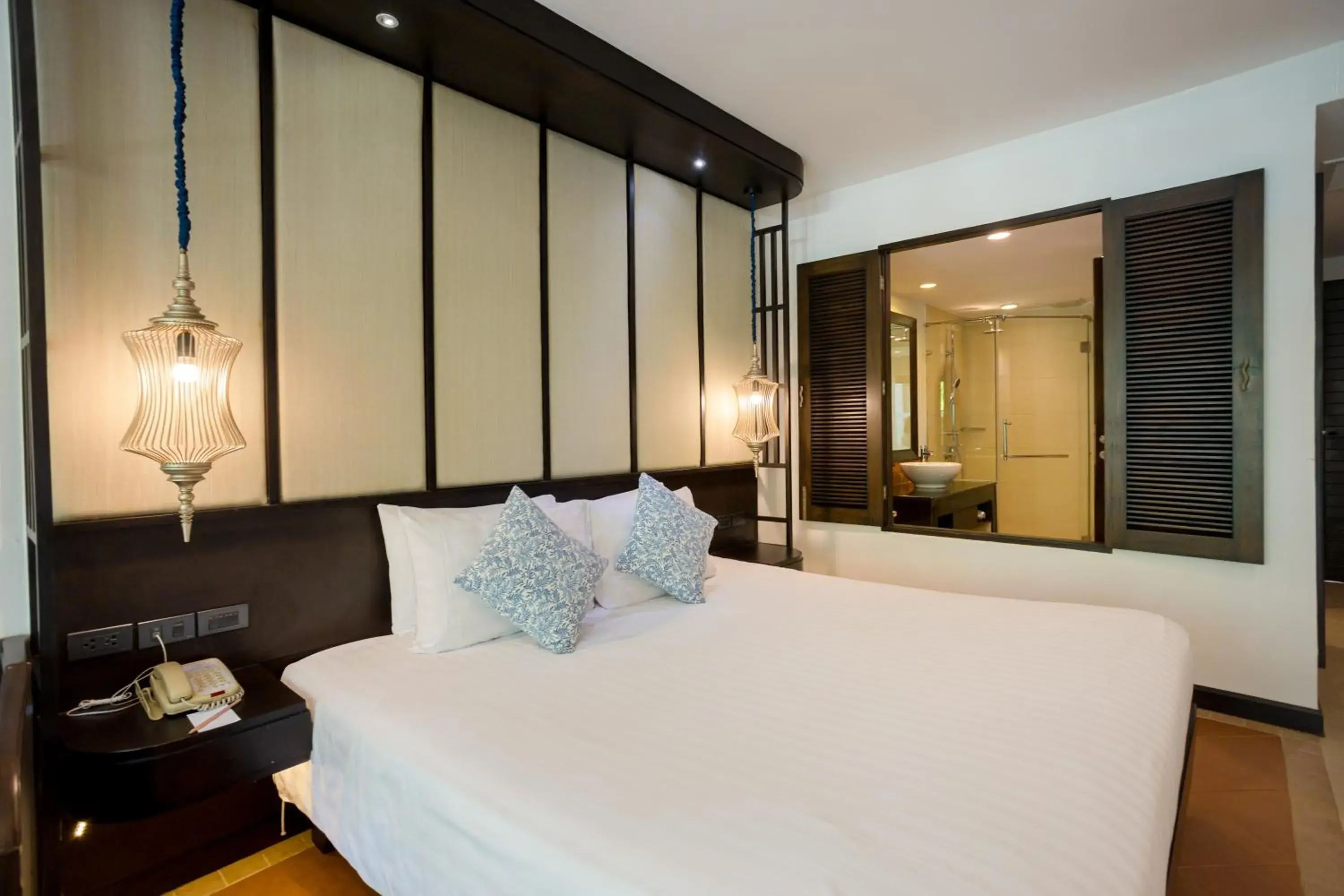 Bed in Ravindra Beach Resort & Spa - SHA Extra Plus
