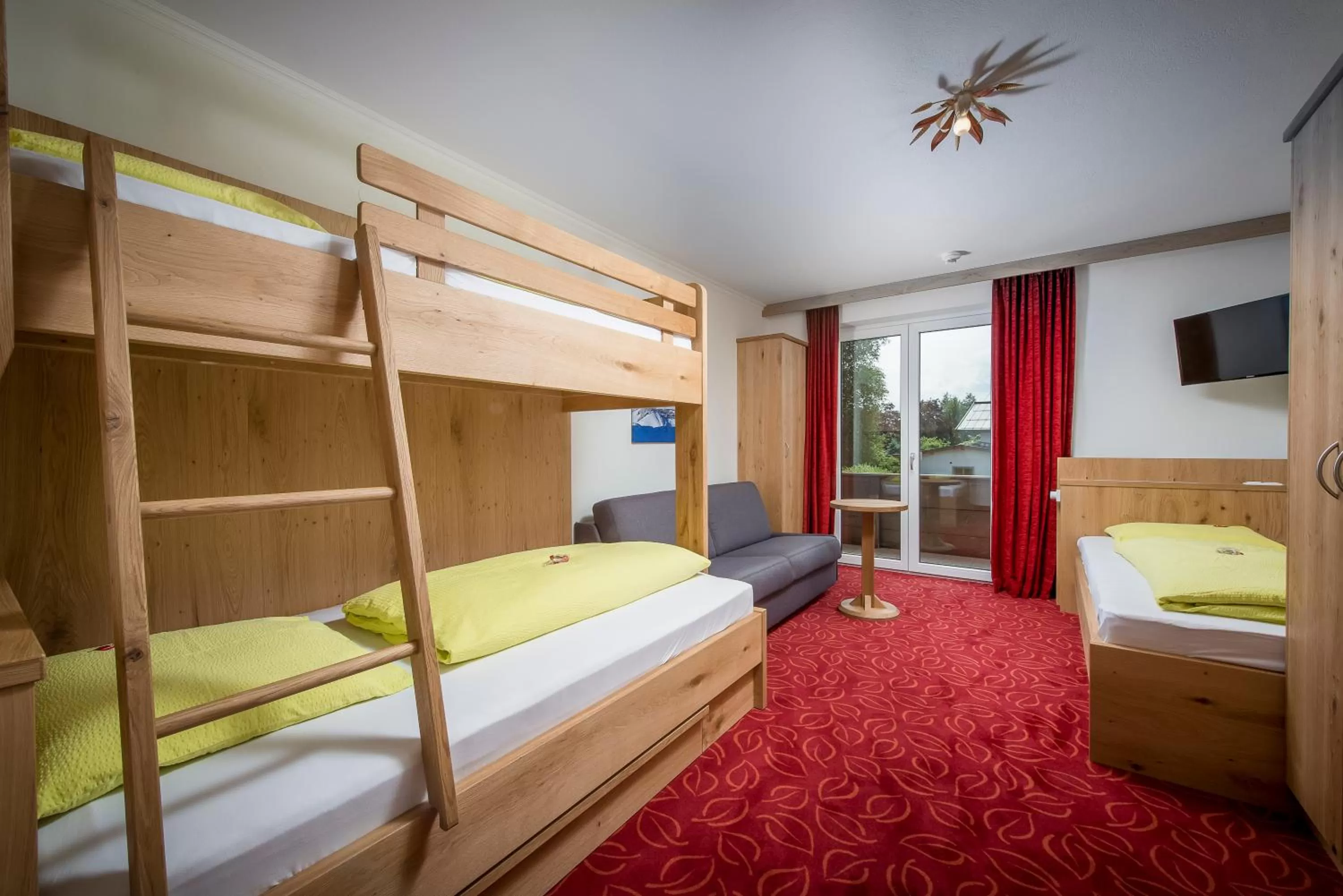 Photo of the whole room, Bed in Familienhotel Central