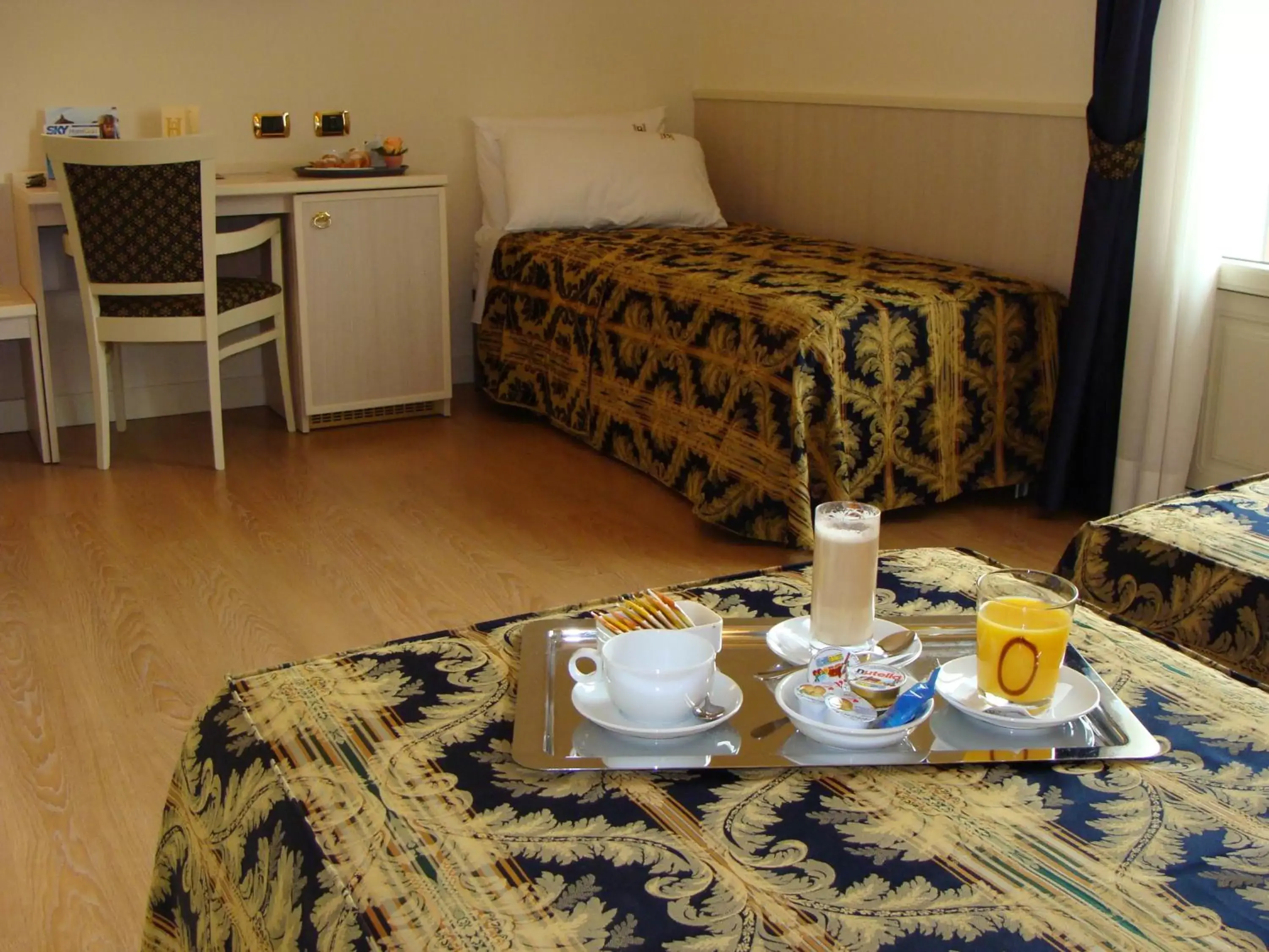 Decorative detail, Bed in Hotel Belforte