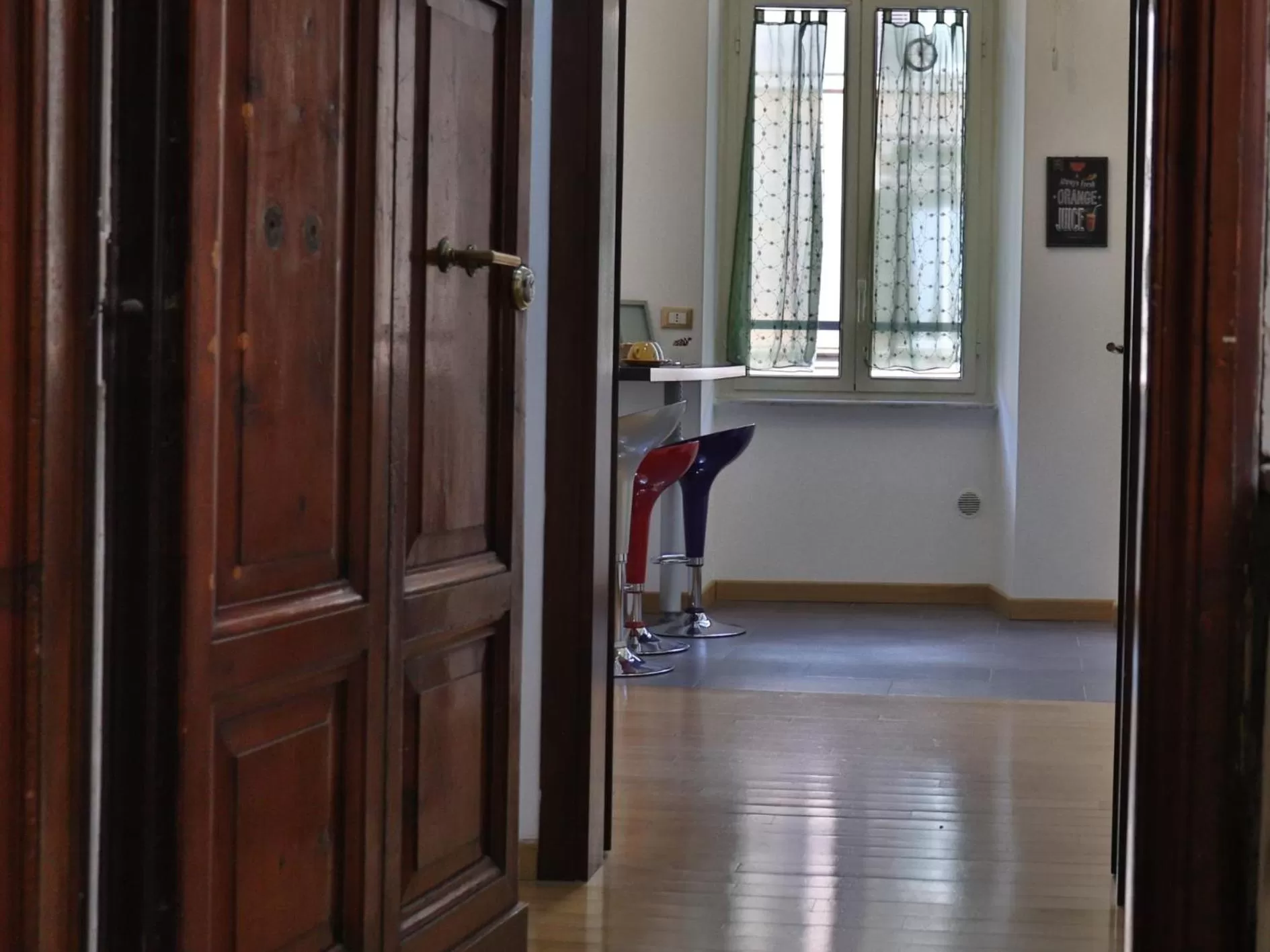 Communal lounge/ TV room in B&B Gaudium Colosseo