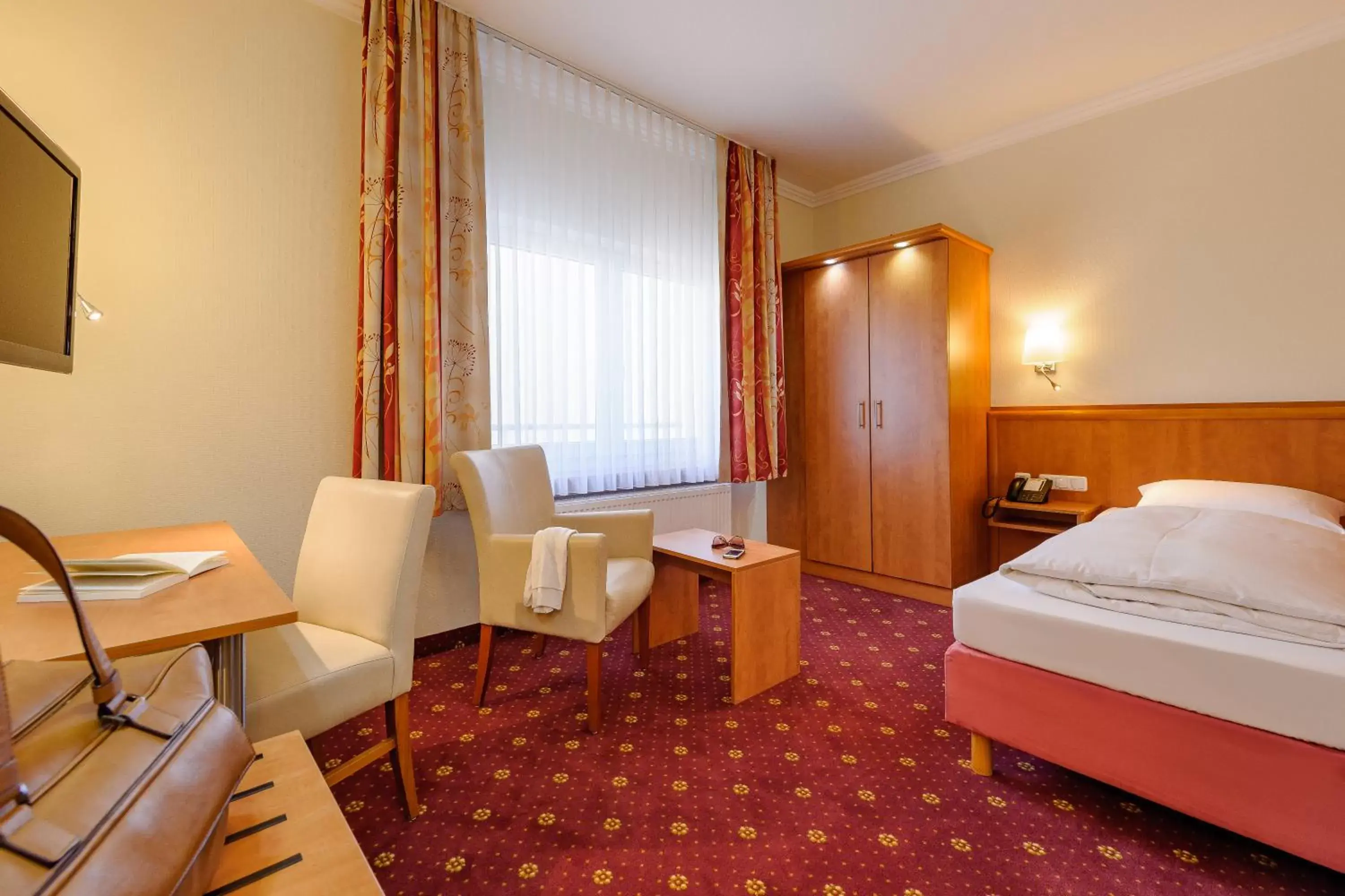 Photo of the whole room in Mercure Hotel Luebeck City Center