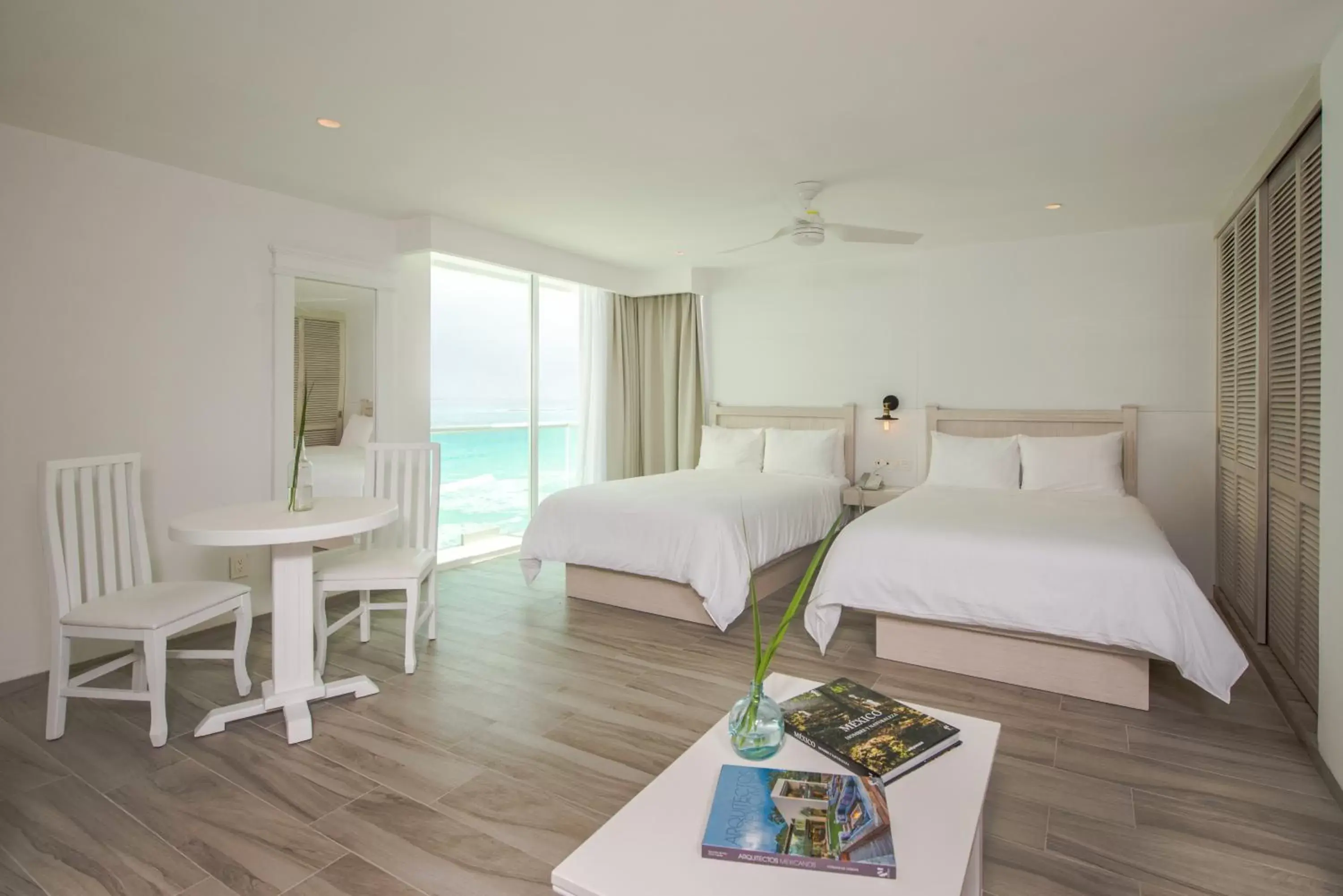 Bedroom in Oleo Cancun Playa Boutique All Inclusive Resort