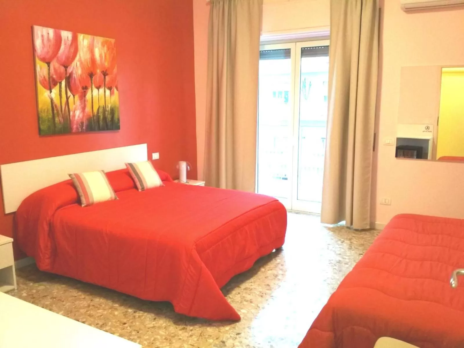 Bed in Michelangelo Rooms