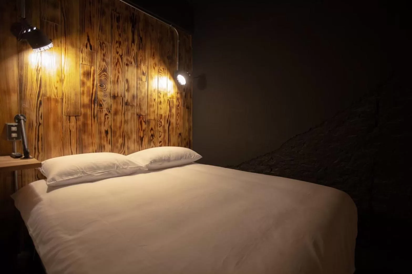 Bed in The Rooms Inn