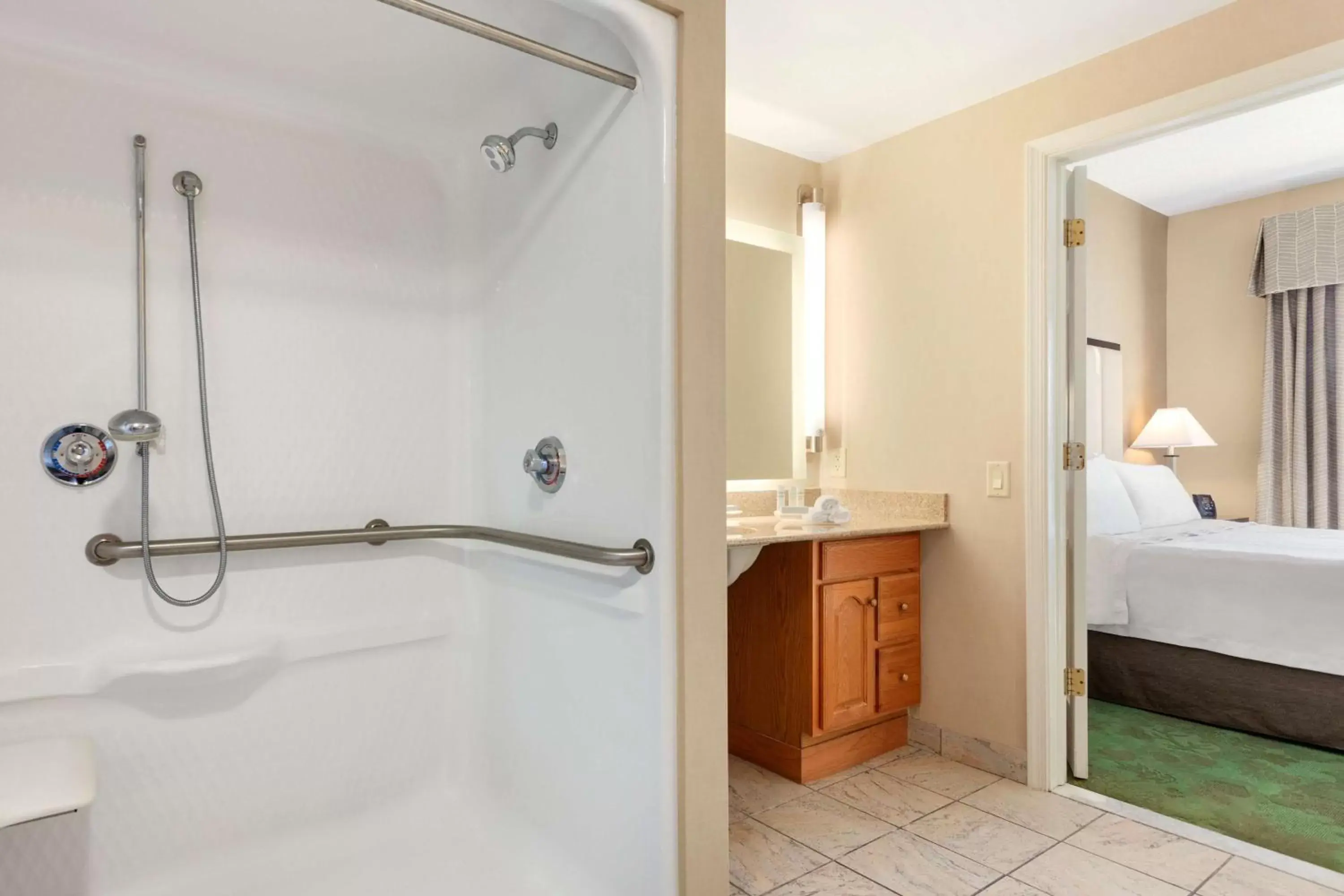 Bed, Bathroom in Homewood Suites Harrisburg-West Hershey Area