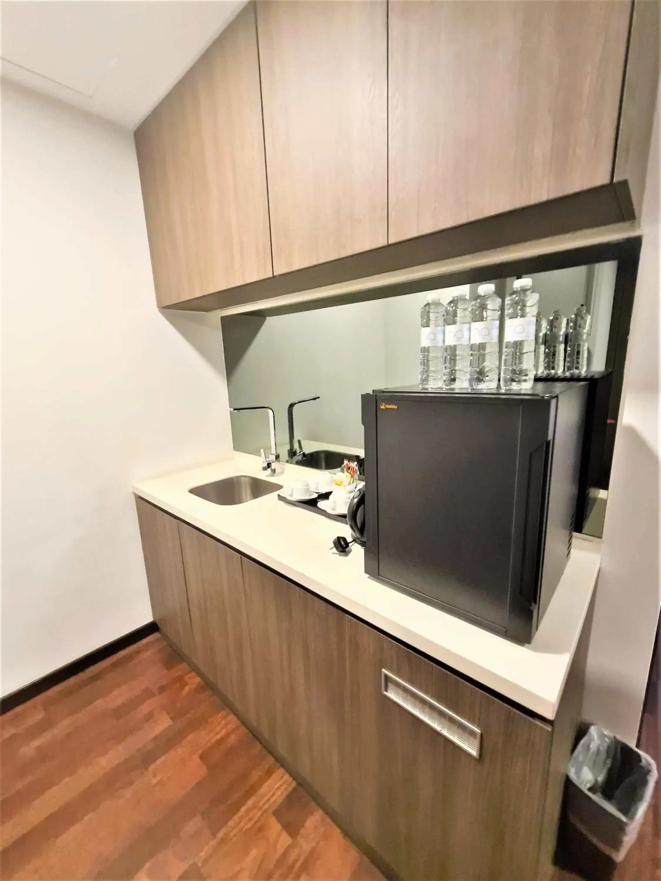 Kitchen/Kitchenette in Nexus Business Suite Hotel