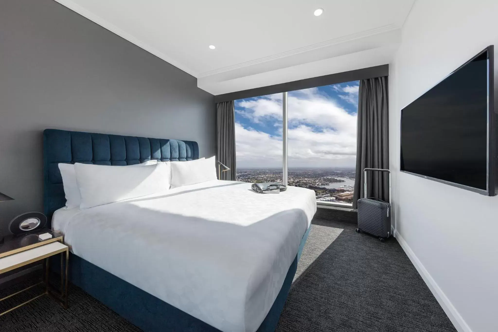 Bed in Meriton Suites World Tower, Sydney