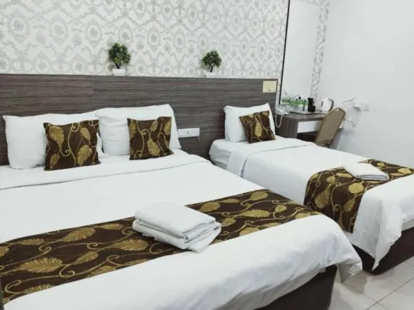 Bed in D'Metro Hotel