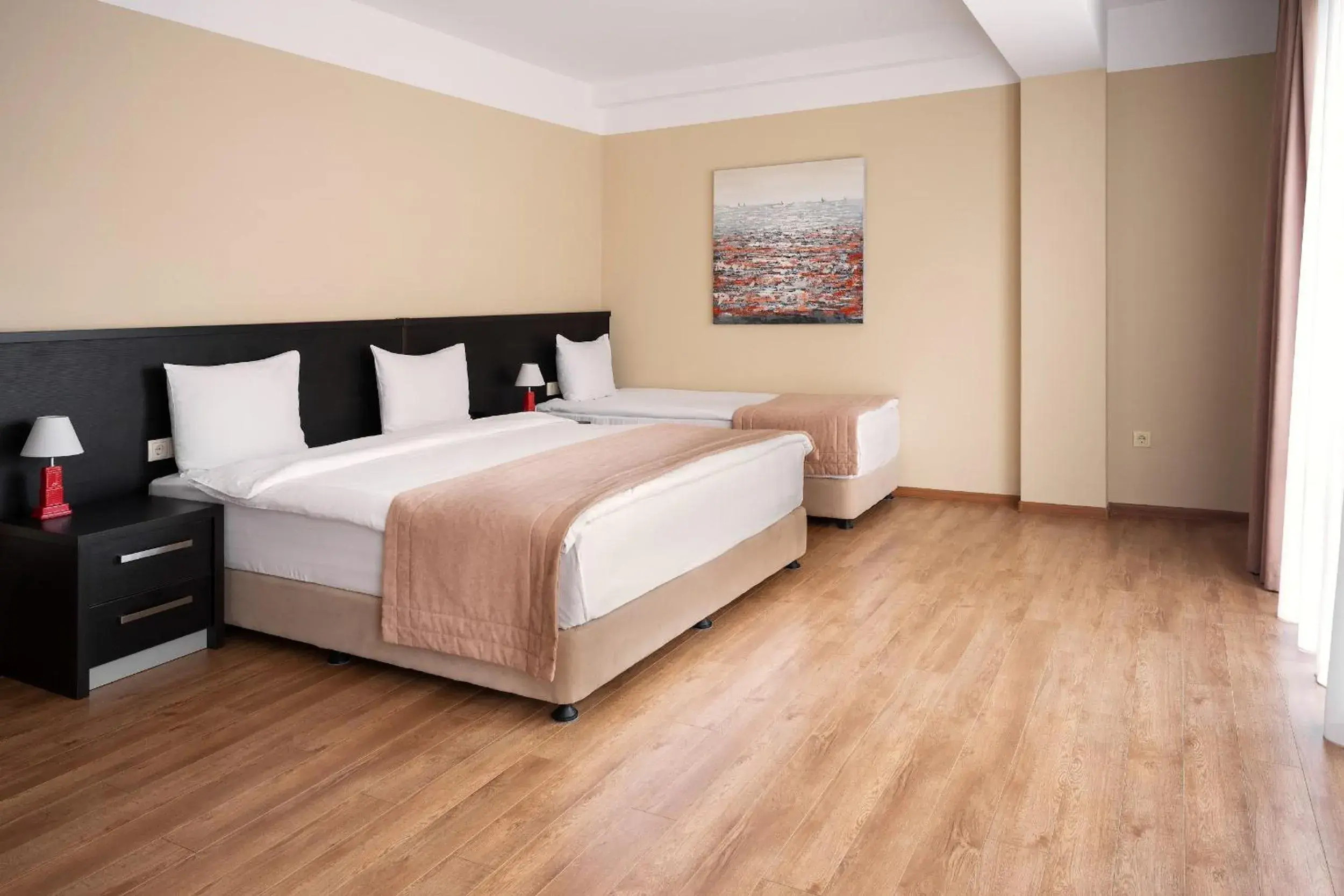 Bed in Sephia Hotel