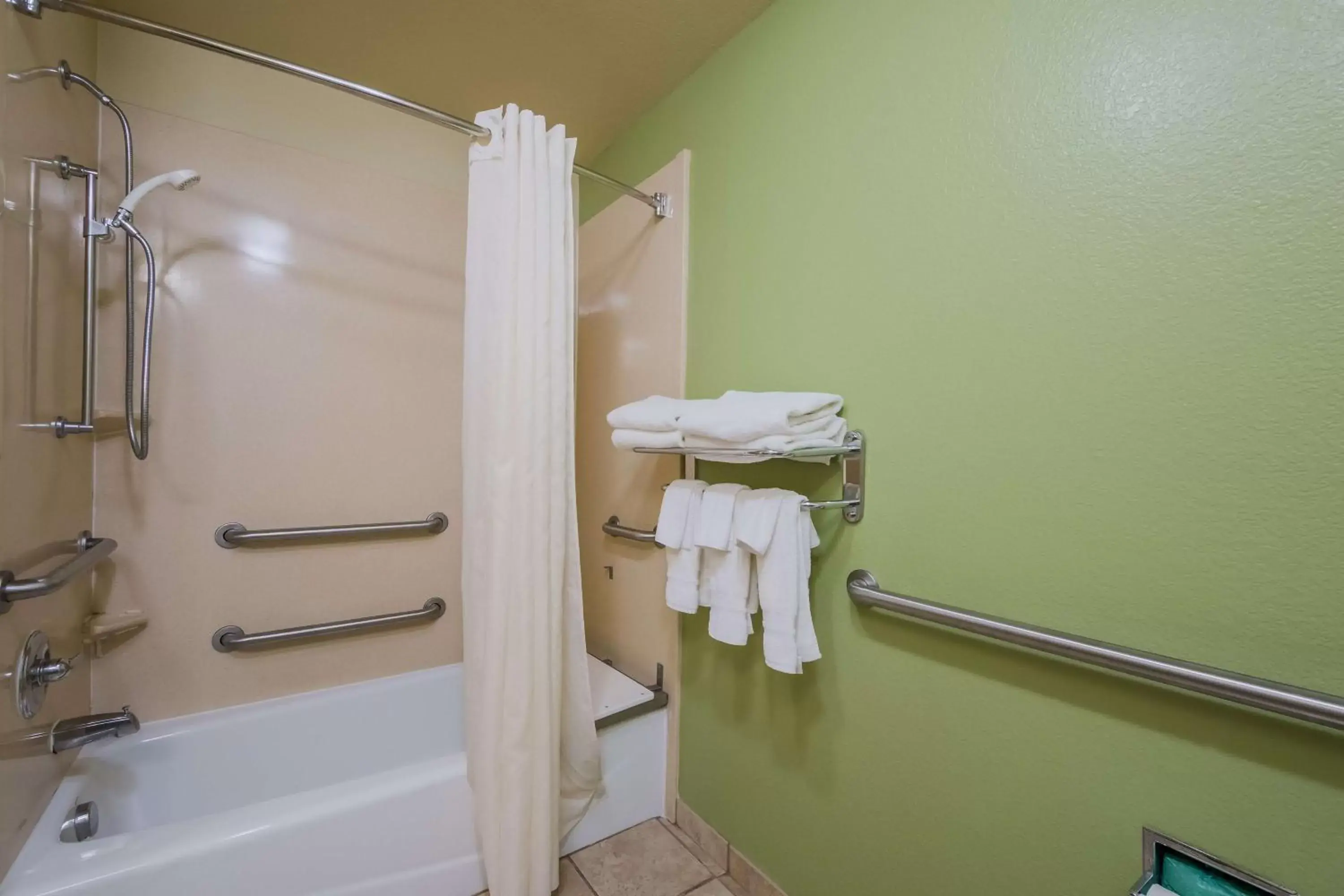 Bathroom in SureStay Plus Hotel by Best Western Near SeaWorld San Antonio