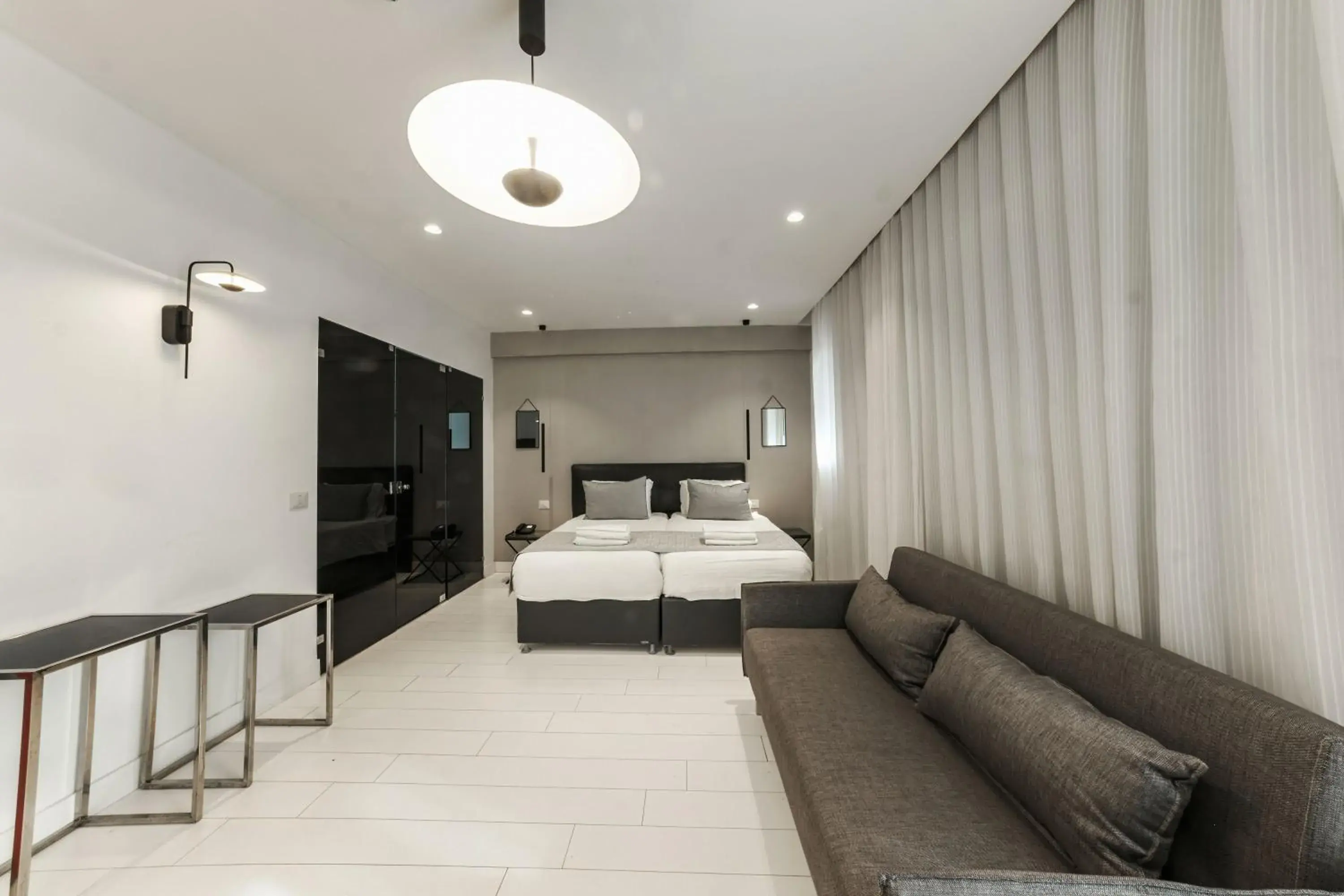 Bedroom, Seating Area in Kikar Boutique Hotel