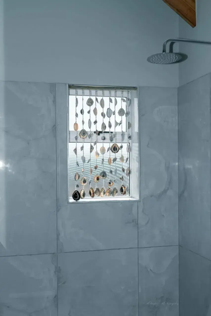 Shower, Bathroom in Blue Bay Lodge