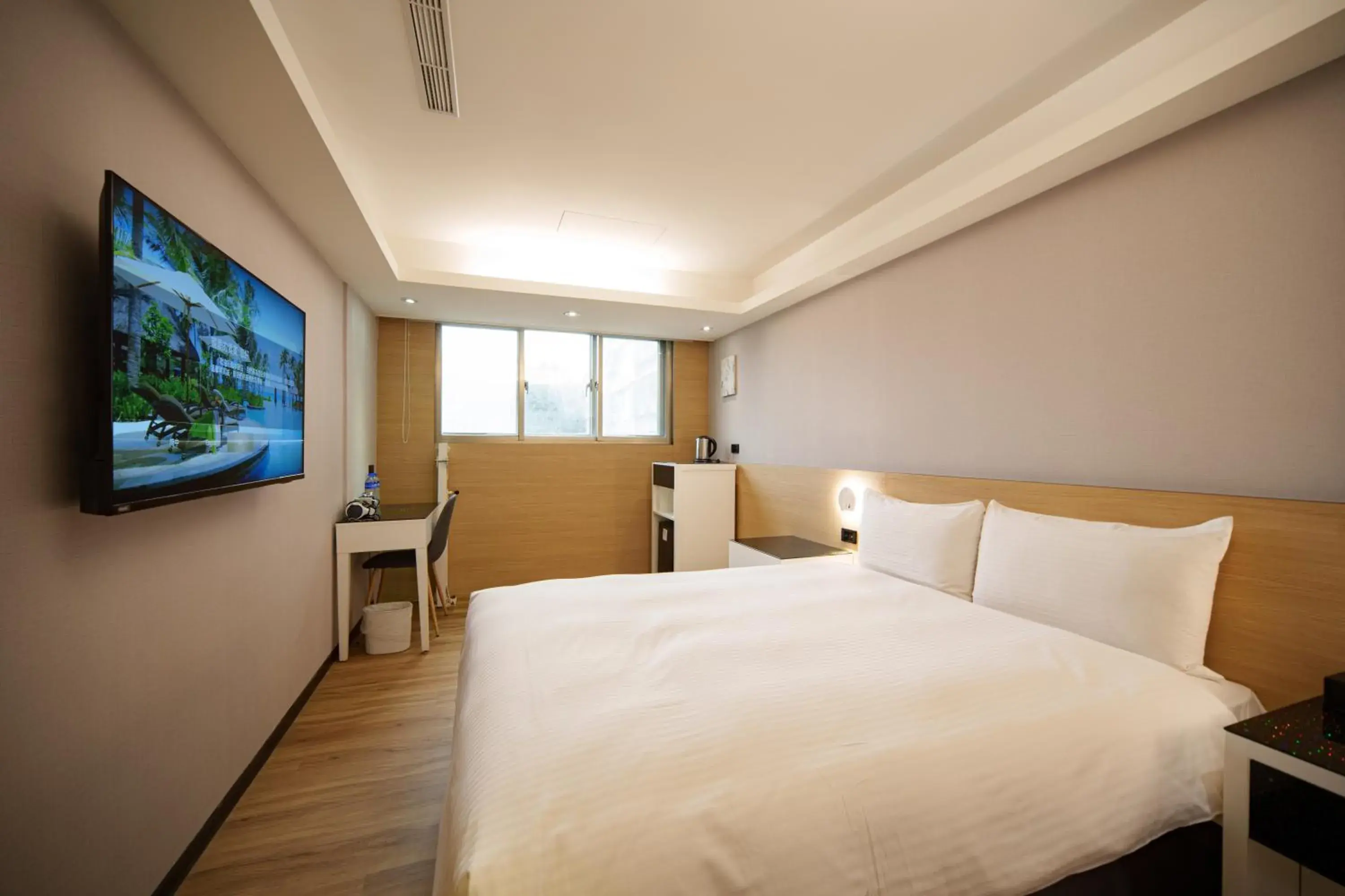 Bed in Hub Hotel Tucheng
