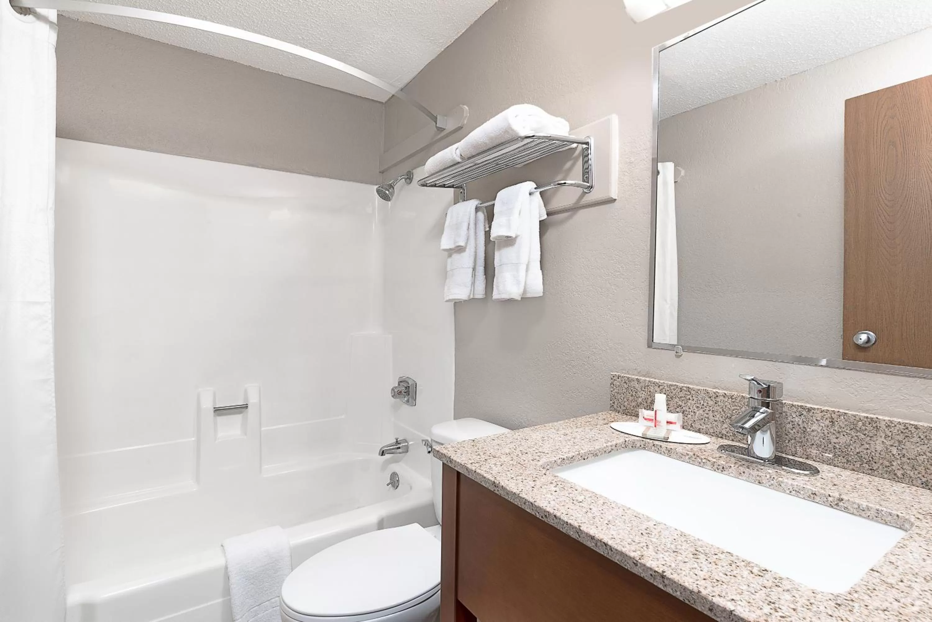 Bathroom in Super 8 by Wyndham Miles City