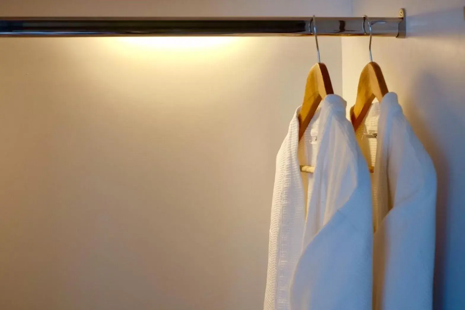 wardrobe, Bed in The Zense Boutique Hotel