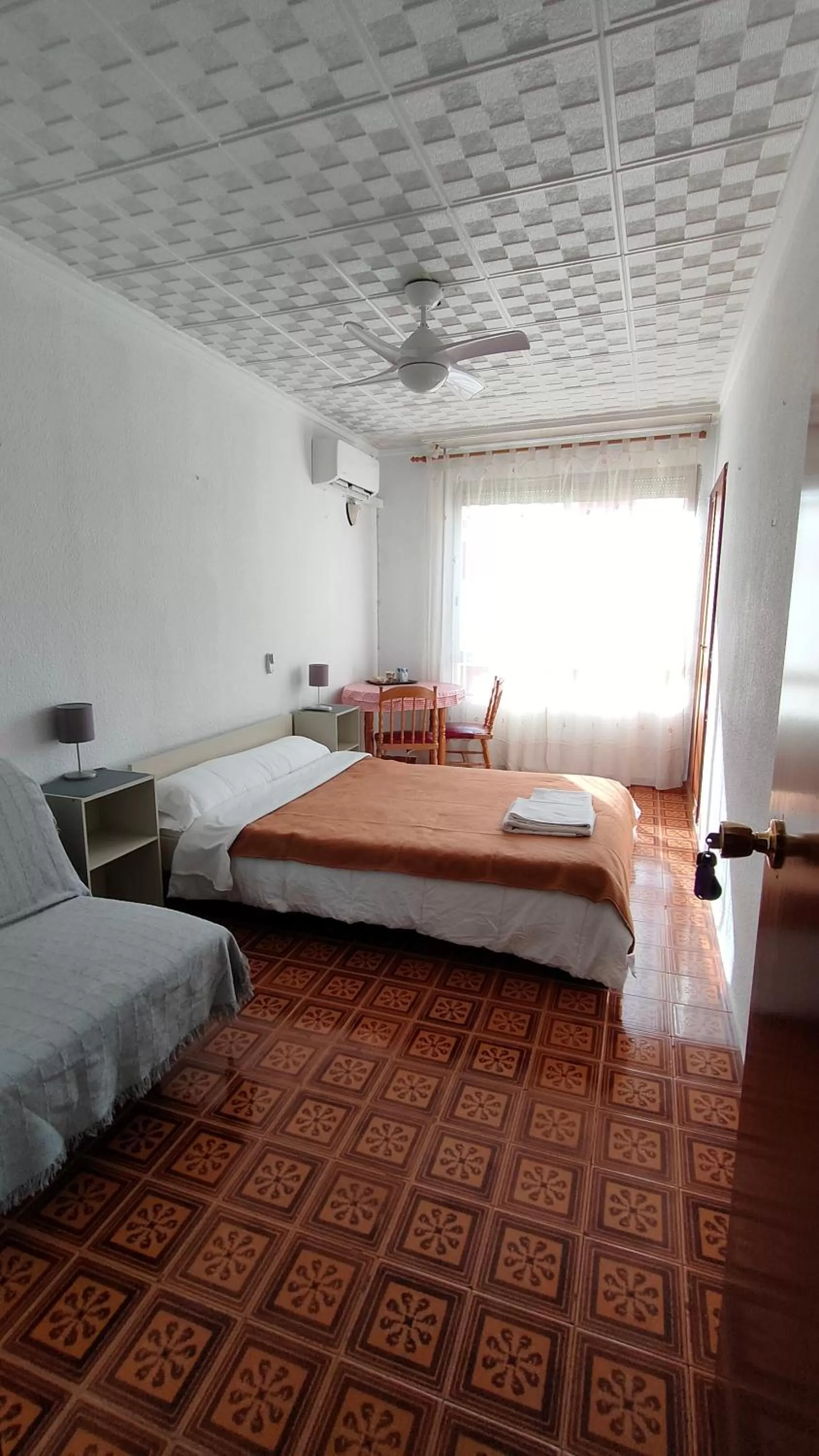 Photo of the whole room, Bed in Pensión Benavente AP-7 3 min - Playa 5 min coche