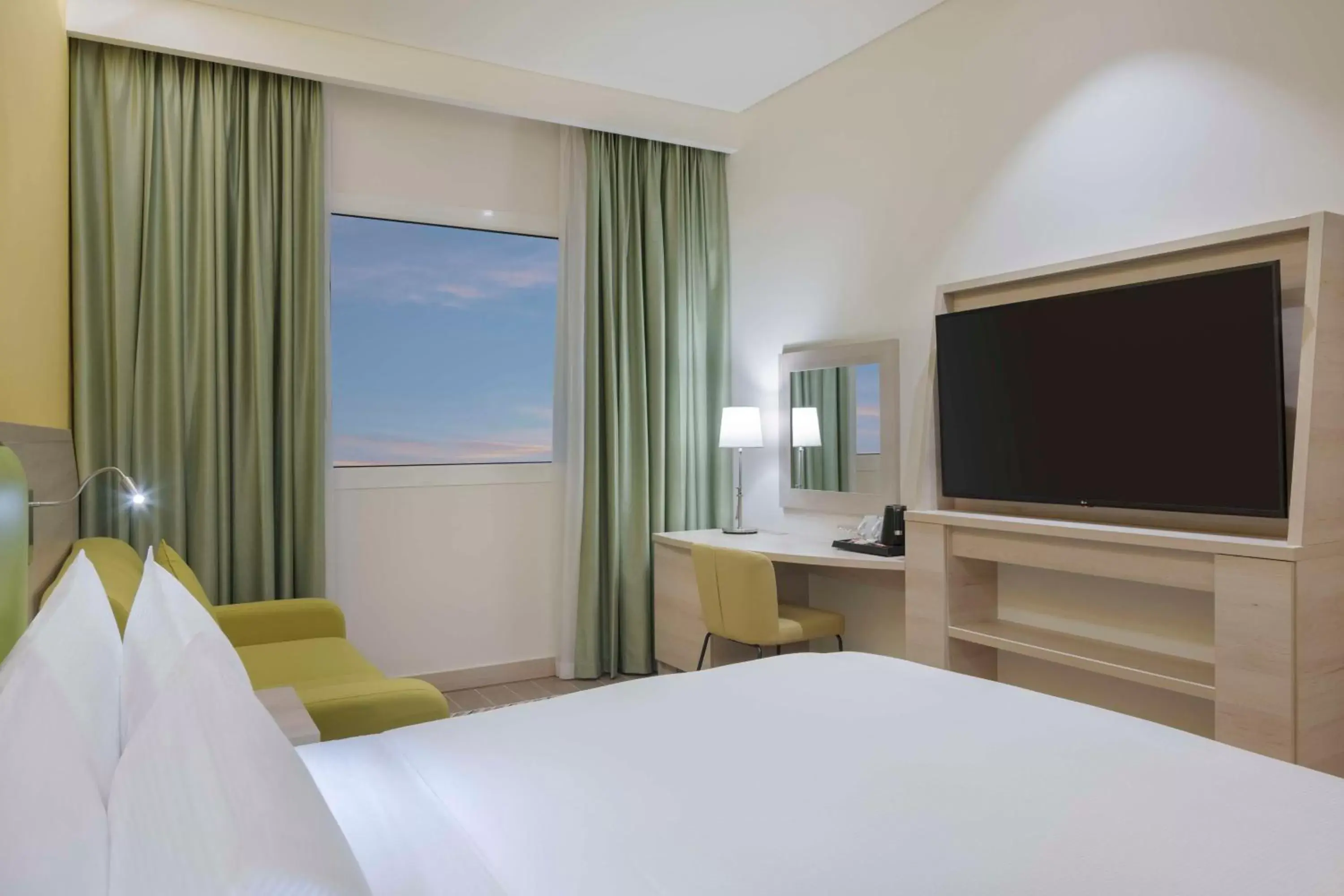 Bedroom, TV/Entertainment Center in Hampton By Hilton Doha Old Town
