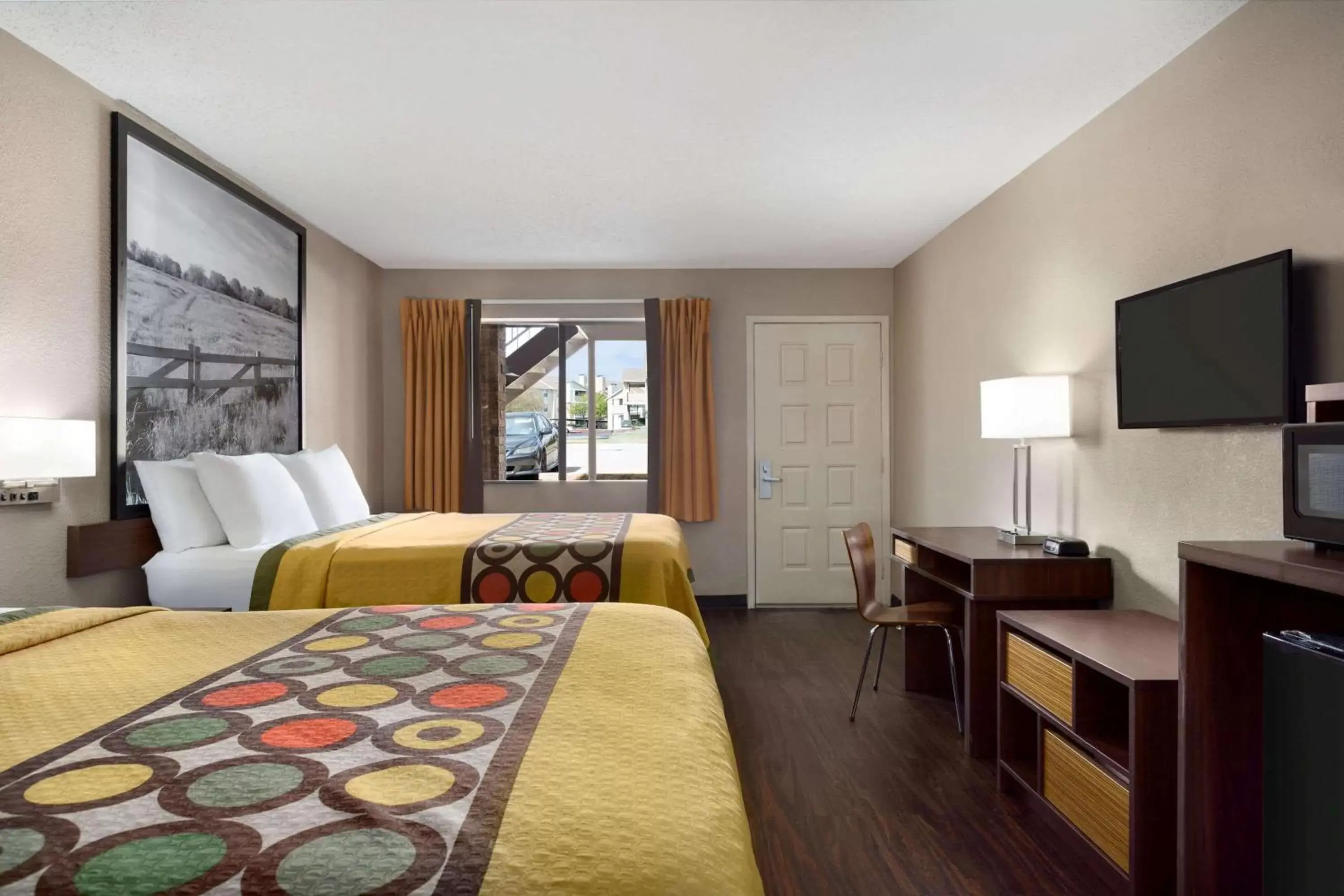 Photo of the whole room, TV/Entertainment Center in Super 8 by Wyndham Universal City