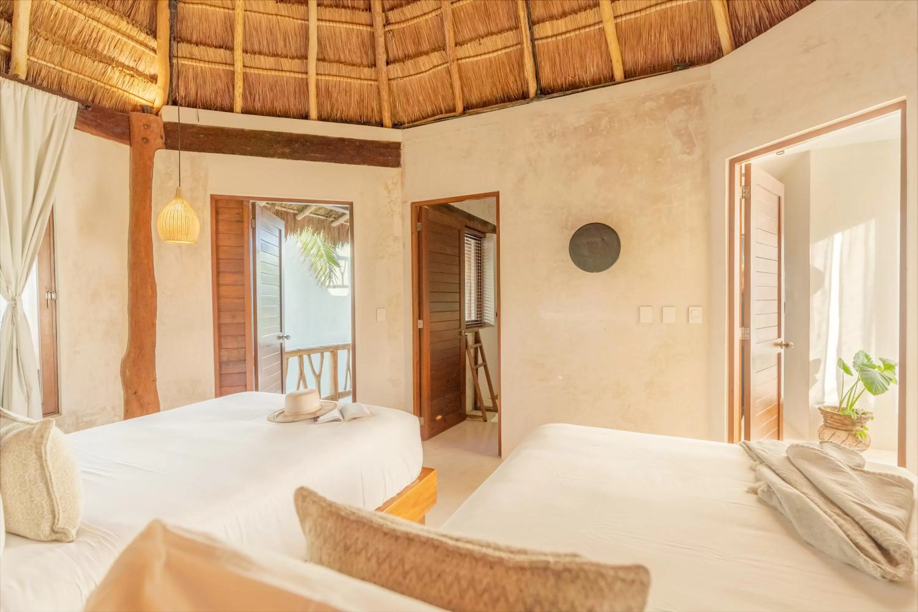 Bed in Casa Ganesh Tulum-Beachfront hotel by Ahau Collection