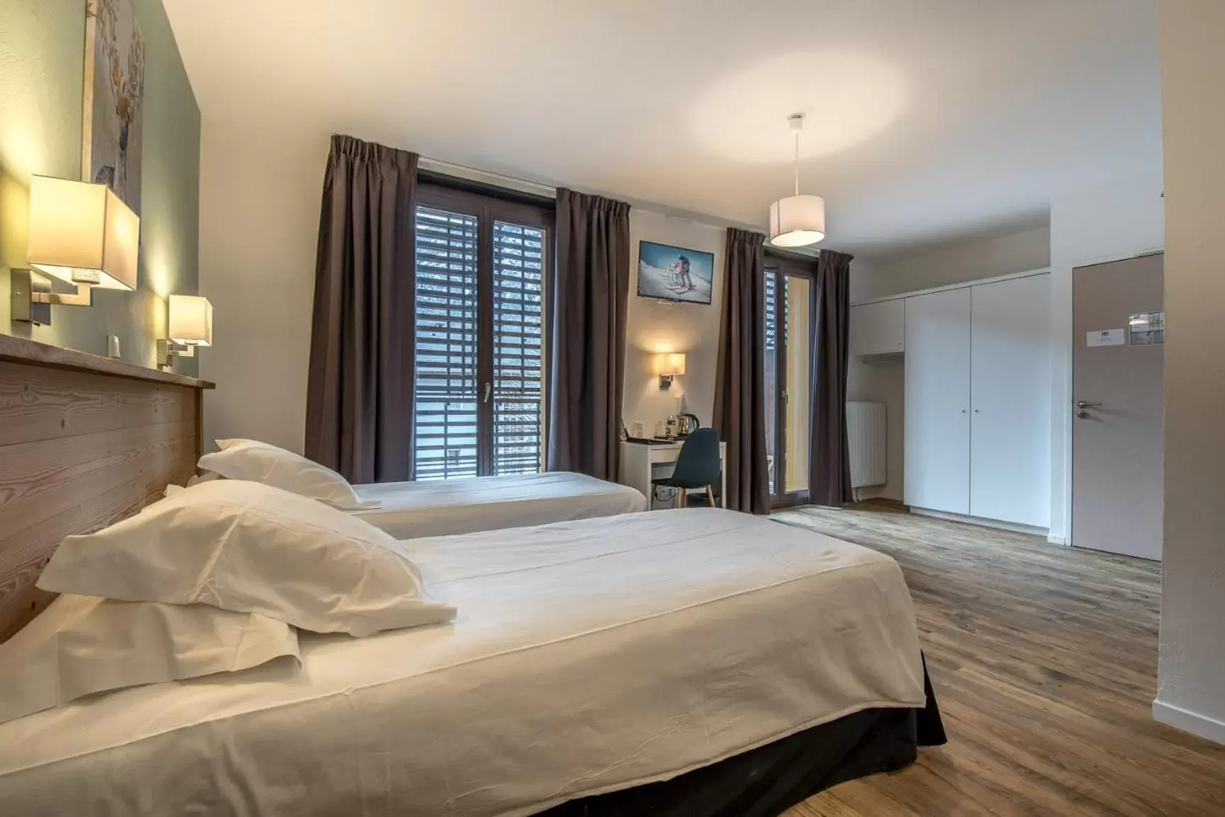 Classic Quadruple Room (4 people) - Non-Smoking in Hôtel Le Marintan Classic Quadruple Room (4 people) - Non-Smoking in Hôtel Le Marintan