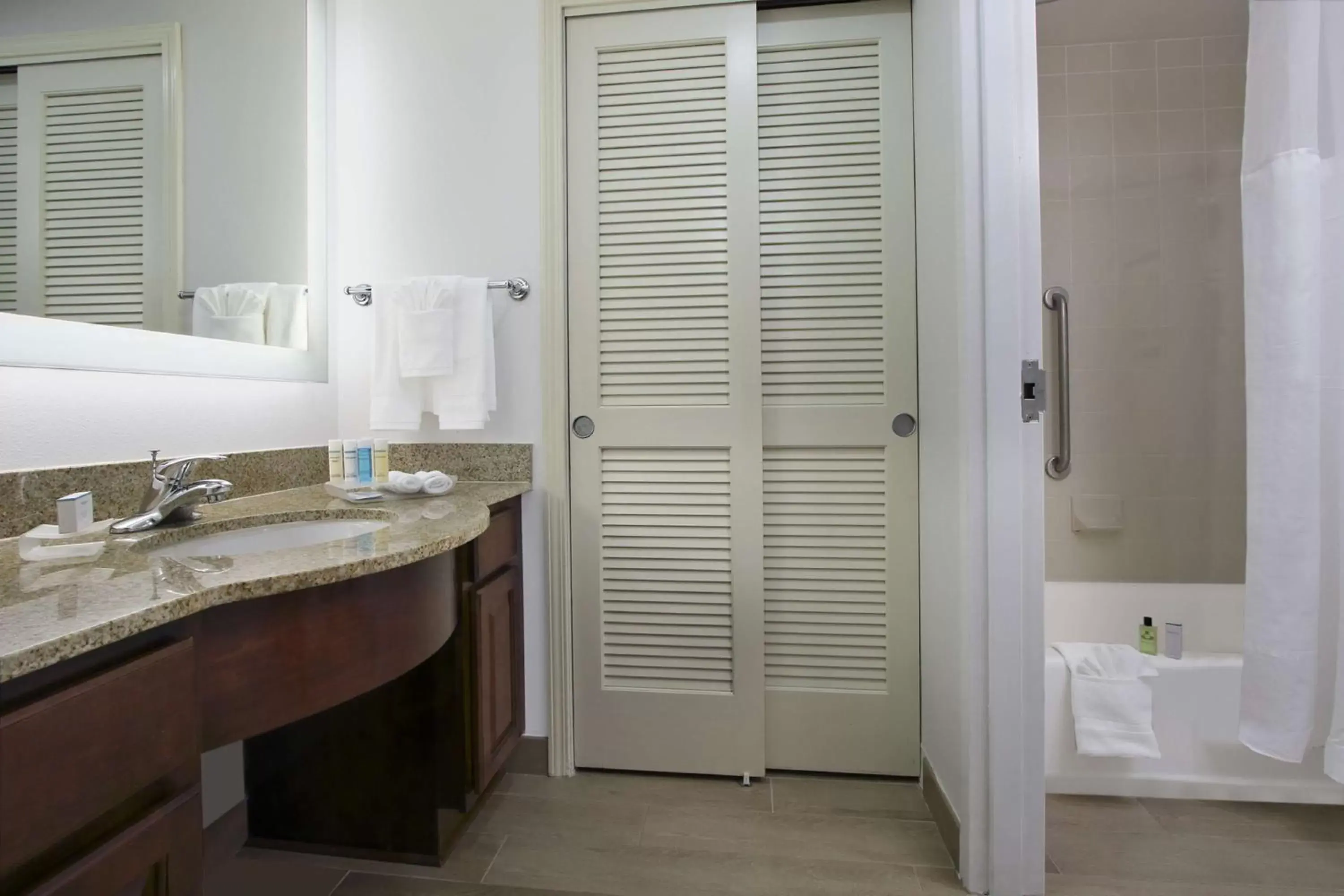 Bathroom in Homewood Suites by Hilton Miami - Airport West