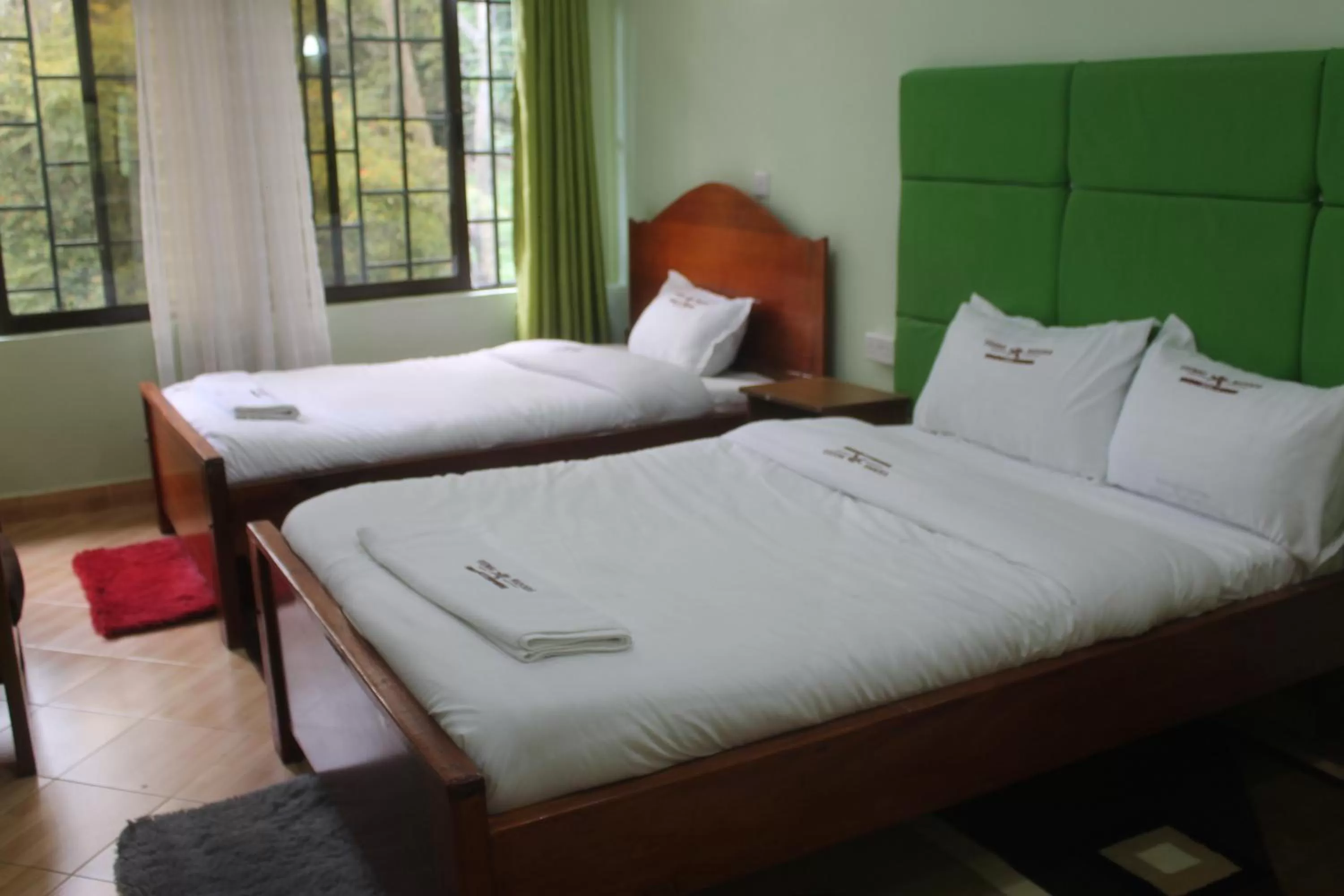 Bed in Vienna Woods Hotel Nakuru