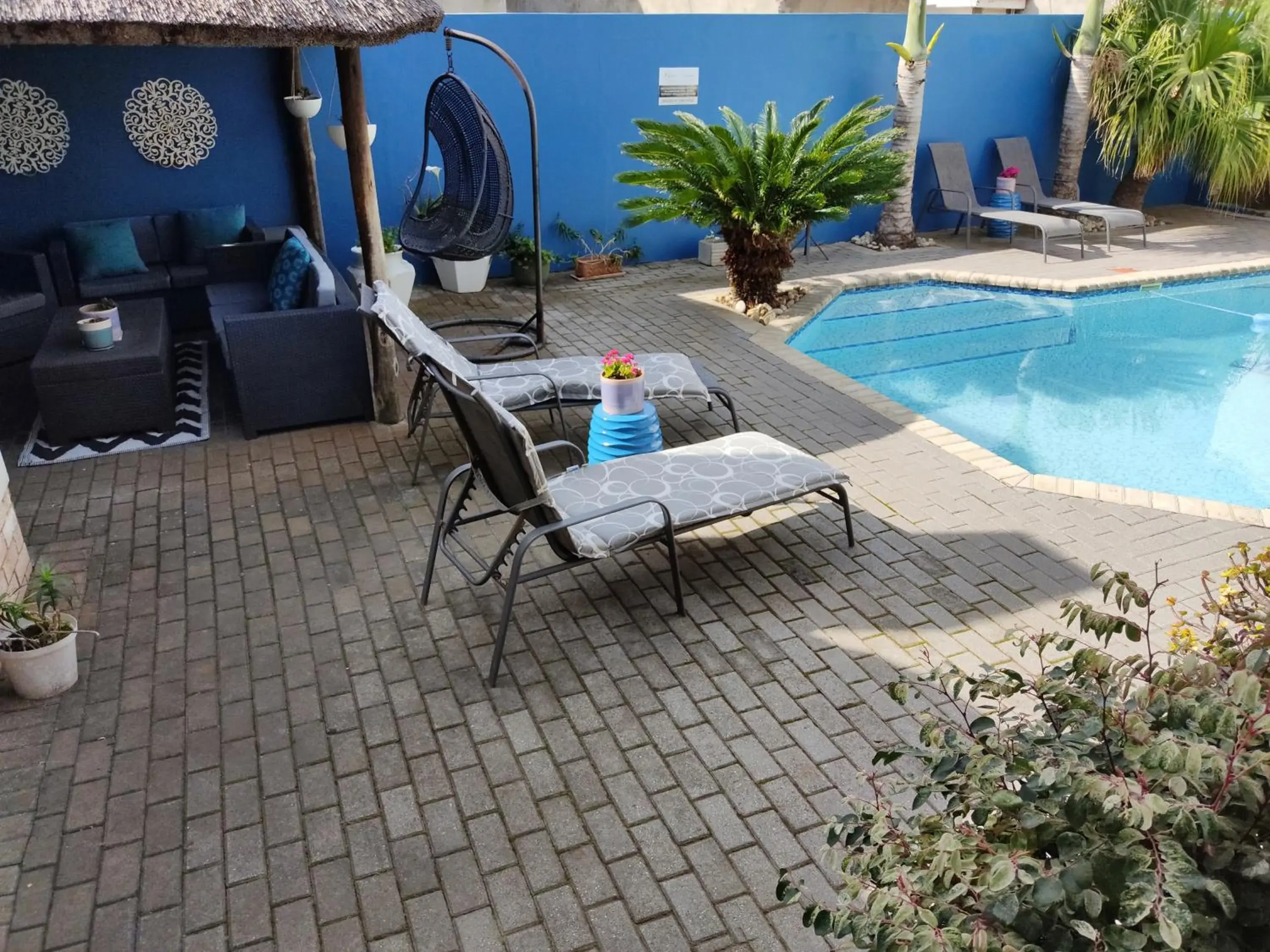 Seating area, Swimming Pool in Palm Beach Guesthouse