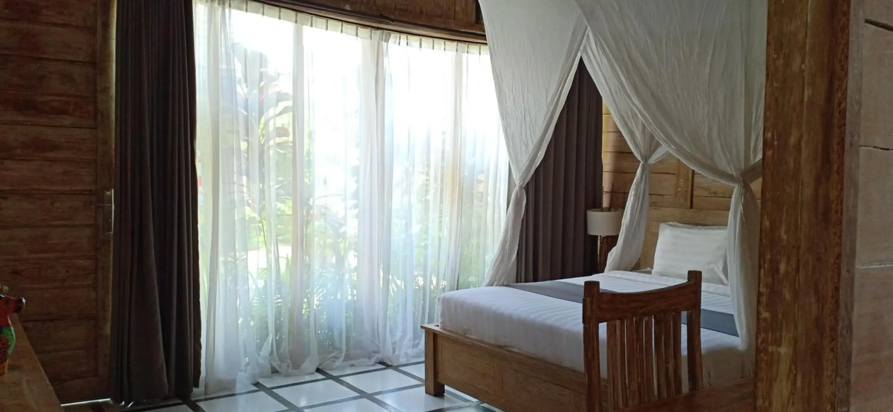 Bed in Umaya Villa Ubud