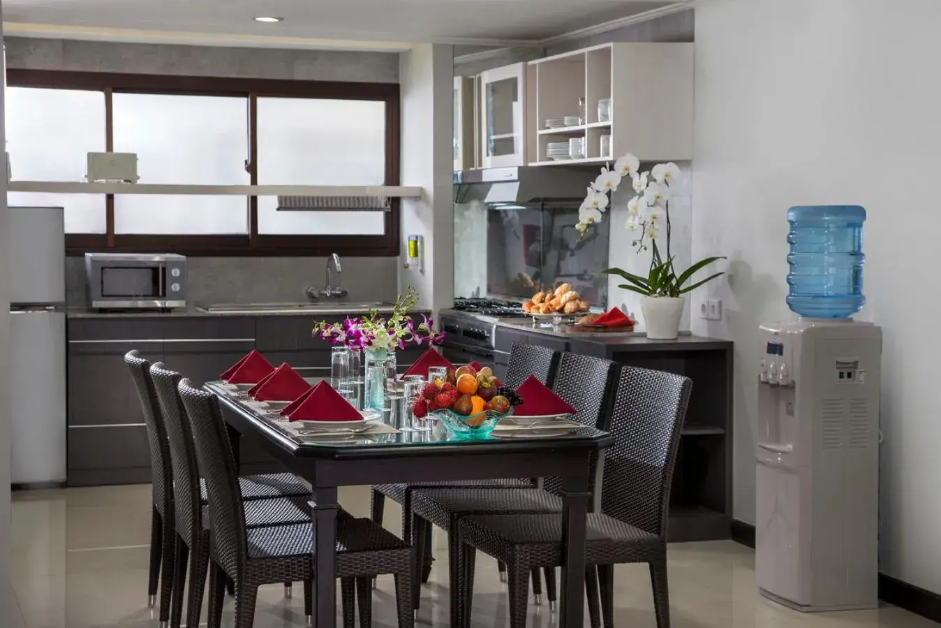 Kitchen or kitchenette, Dining Area in Prime Plaza Suites Sanur – Bali